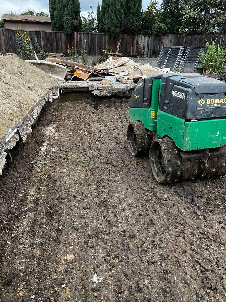 Bomag Compactor on Pool Site
