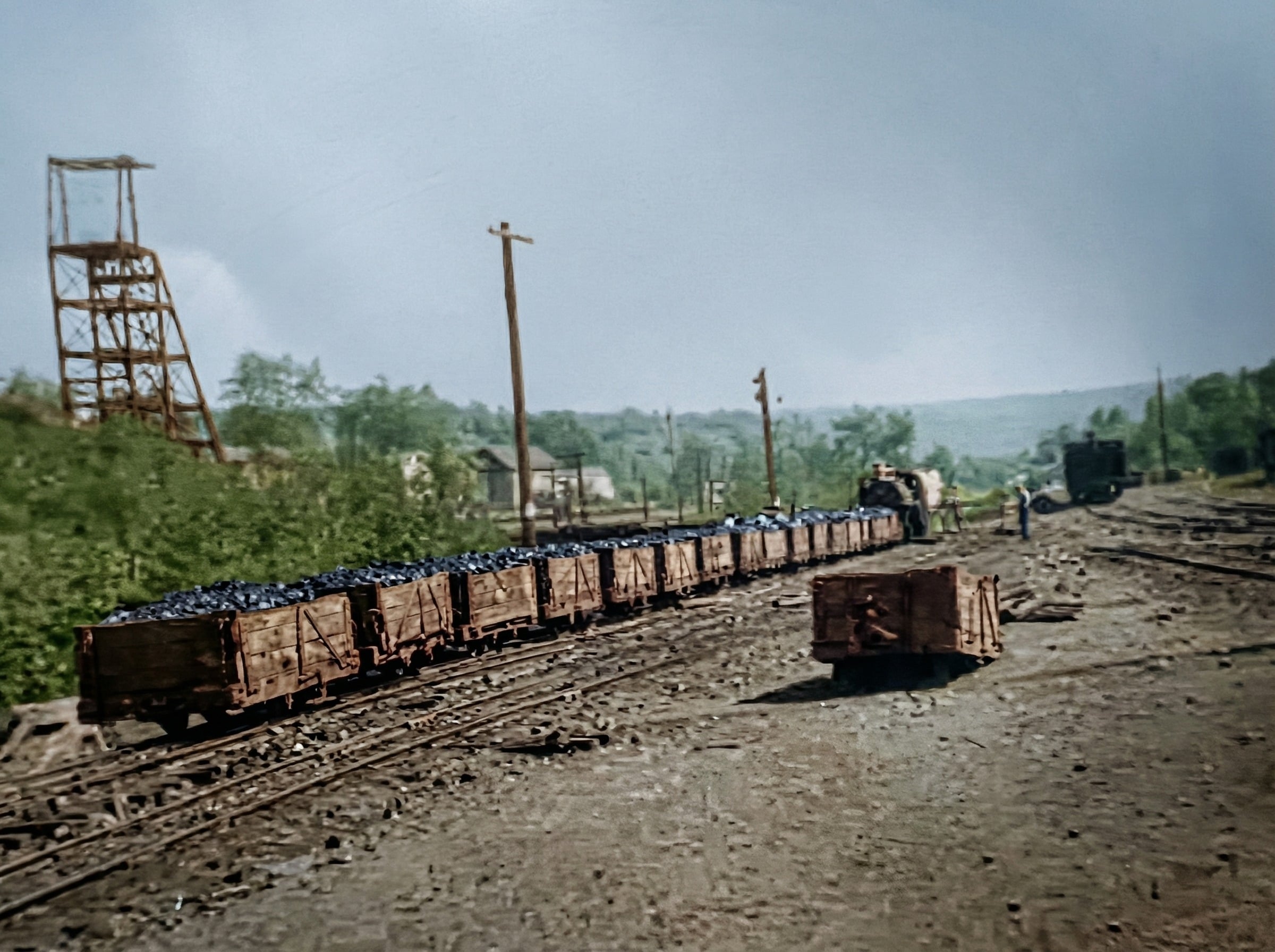 Historic anthracite mine cars on narrow-gauge tracks at a D&H coal mining operation