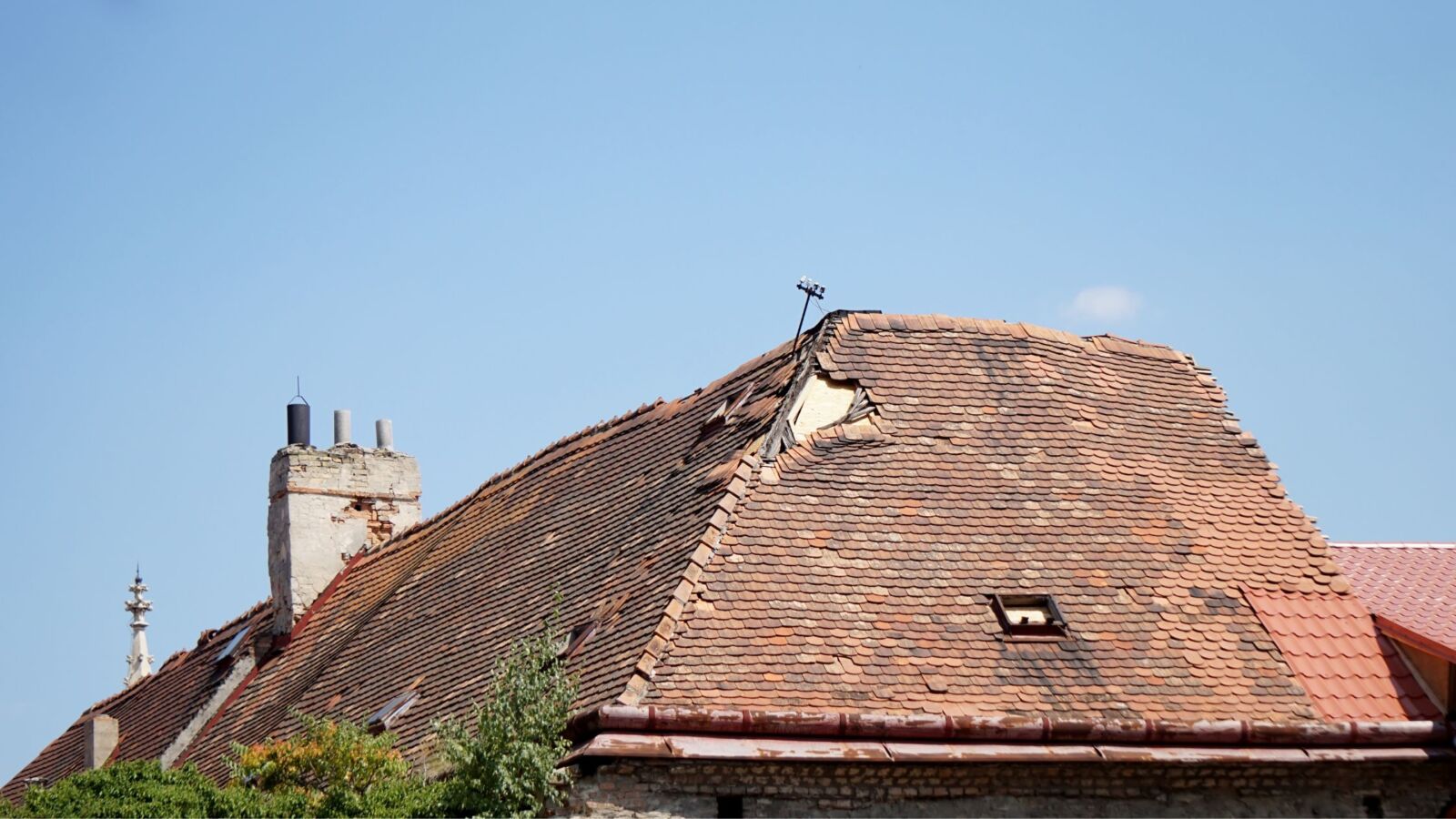 Storm damage to a residential roof