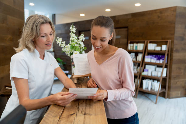 Happy salon owner reviewing their new professional website - LocalWebEdge customer satisfaction