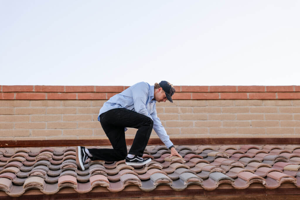 Roof tile repair in progress