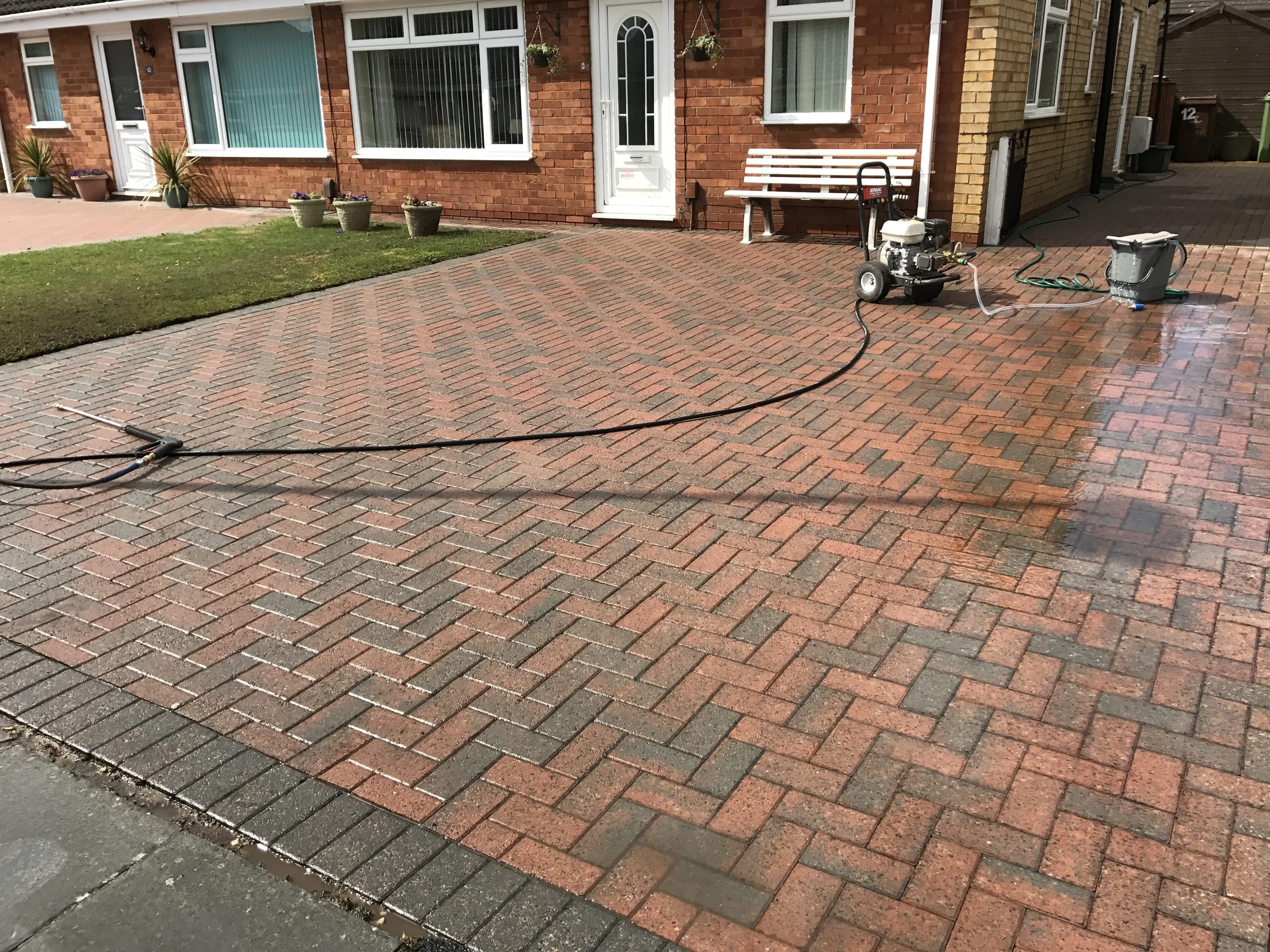 Clean restored driveway after professional powerwashing and cleaning in York, Newcastle, Cambridge