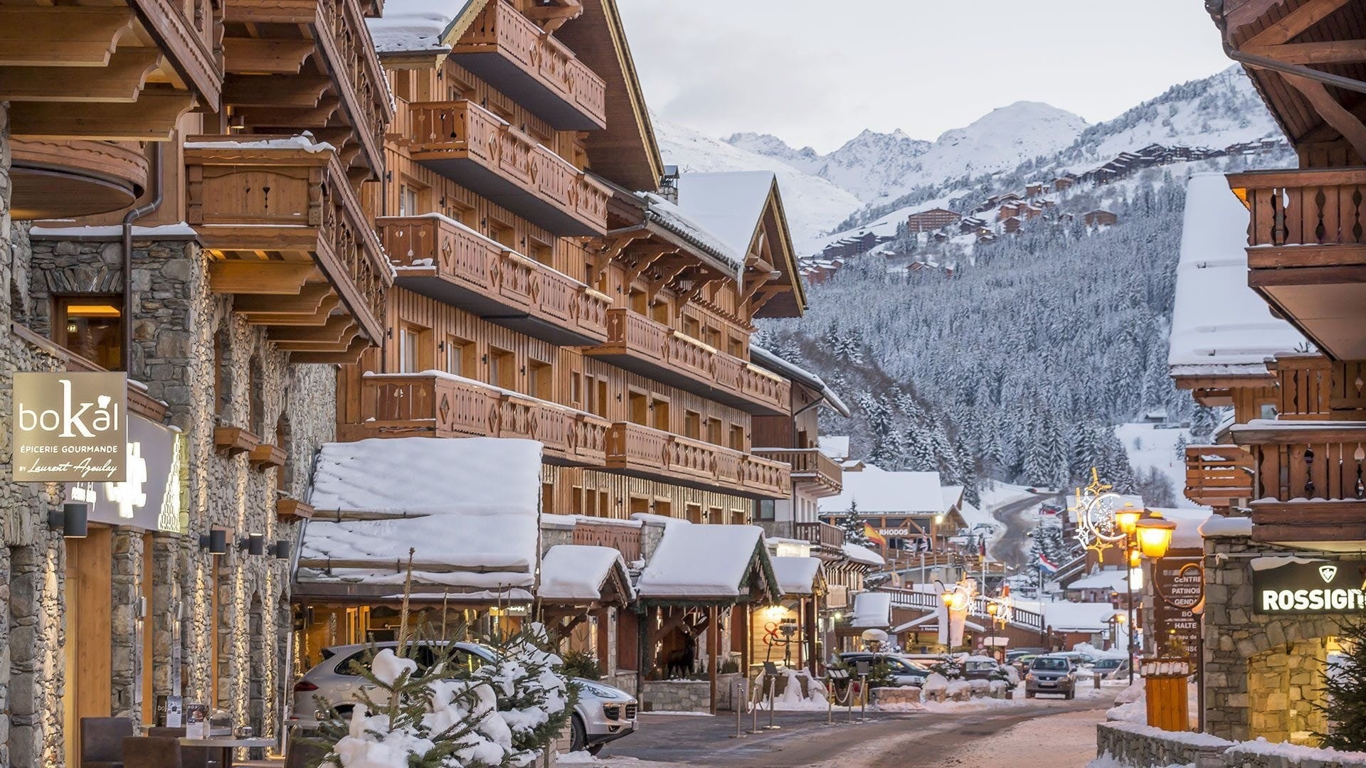 Méribel Centre village street in winter with chalets and shops