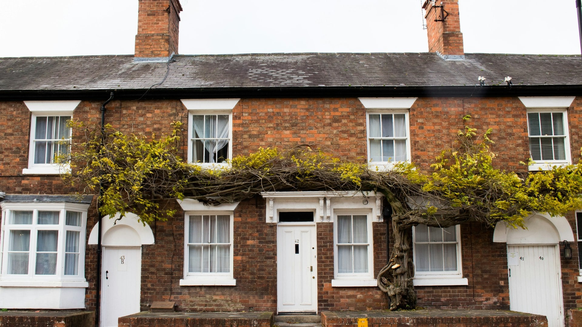 Brick terraced cottages with chimneys in Greater Manchester