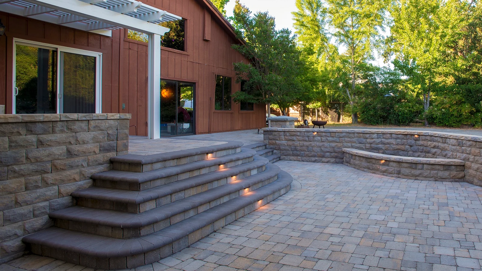 Beautiful outdoor patio and retaining wall by Maxwell Outdoor Design in Springfield Missouri