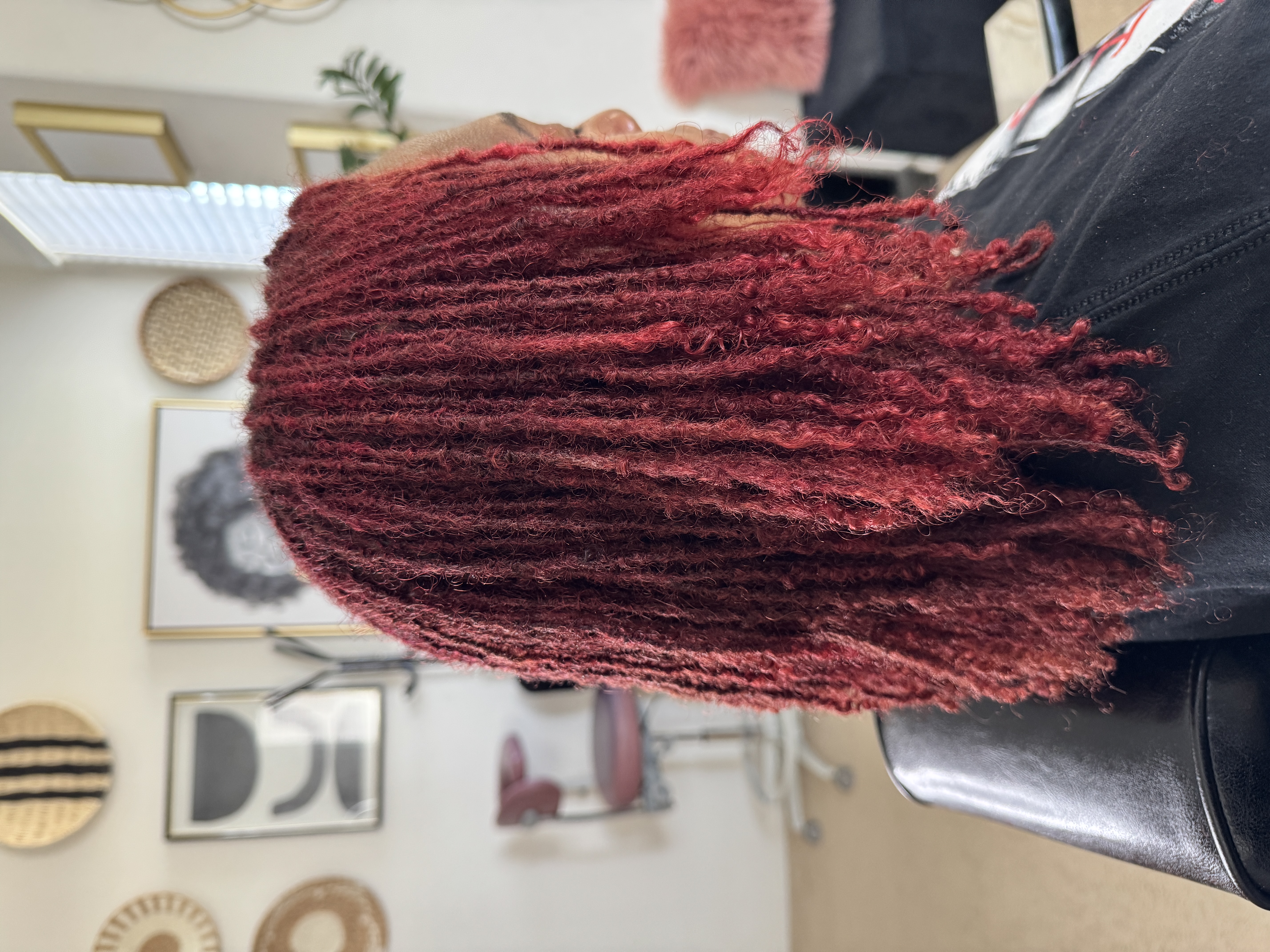 Rich burgundy-red microlocks with beautiful depth and shine at CandieLocks Las Vegas salon