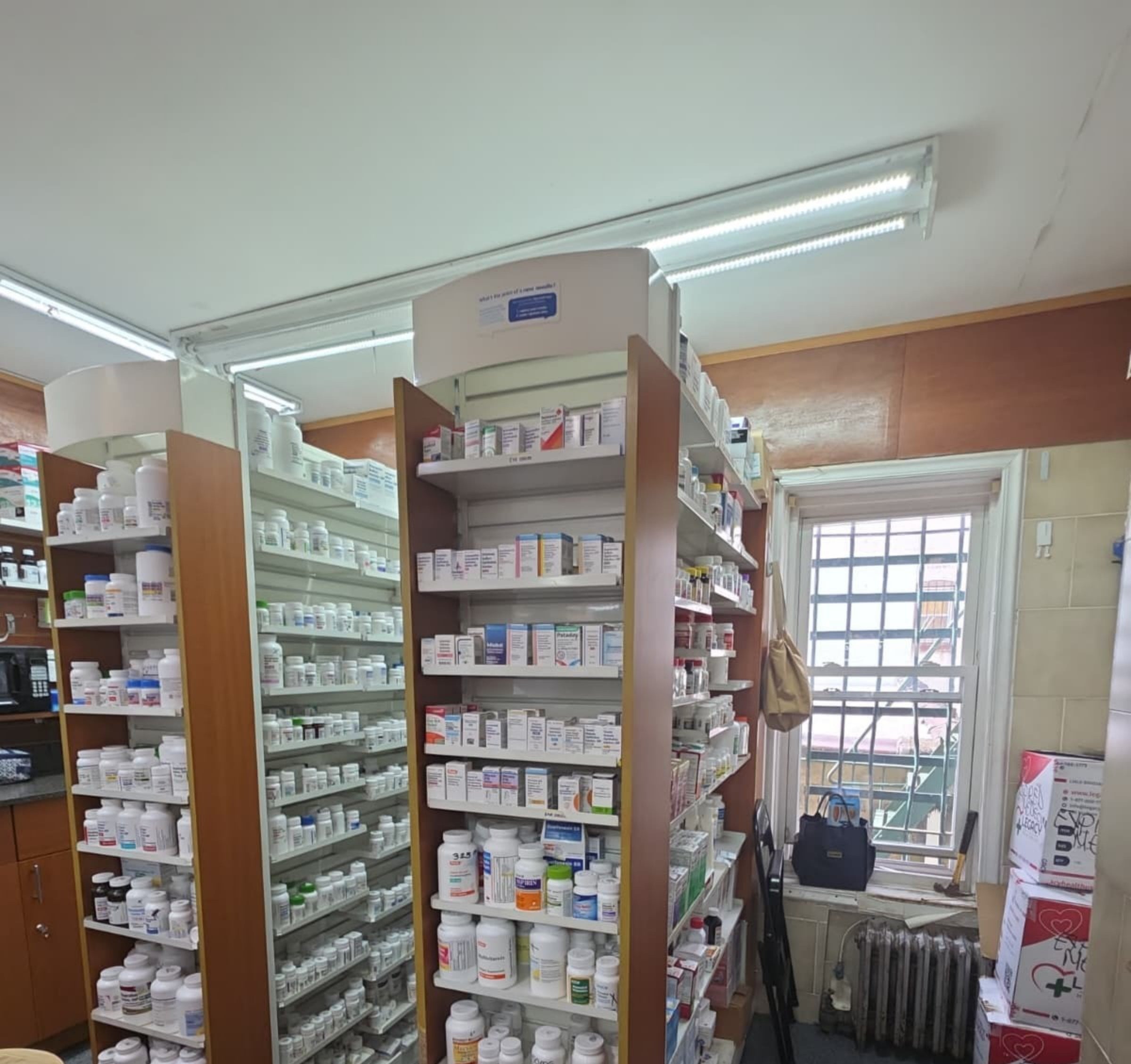 United Care Pharmacy medication shelves