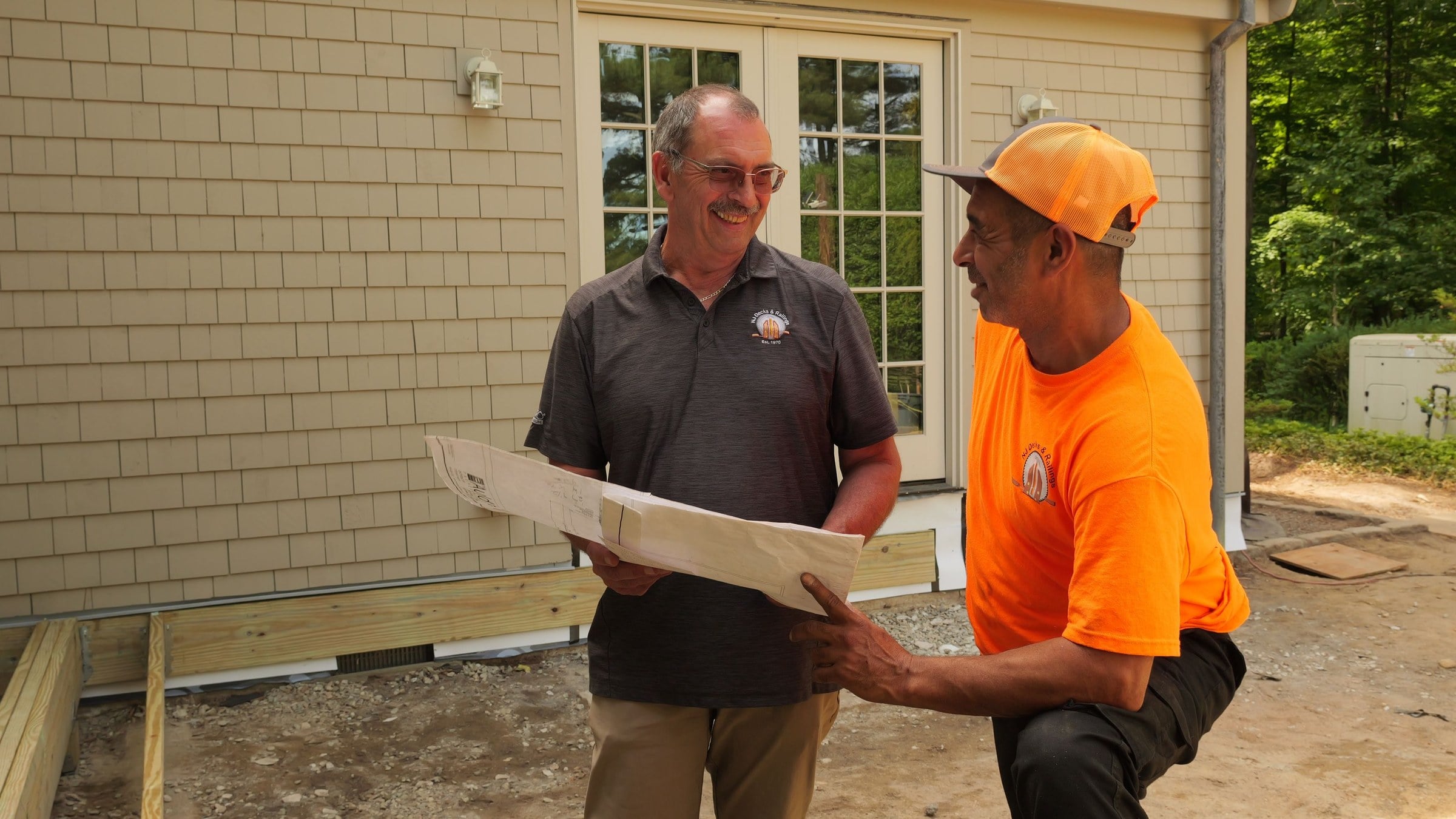 Decking Tacoma team members on a job site