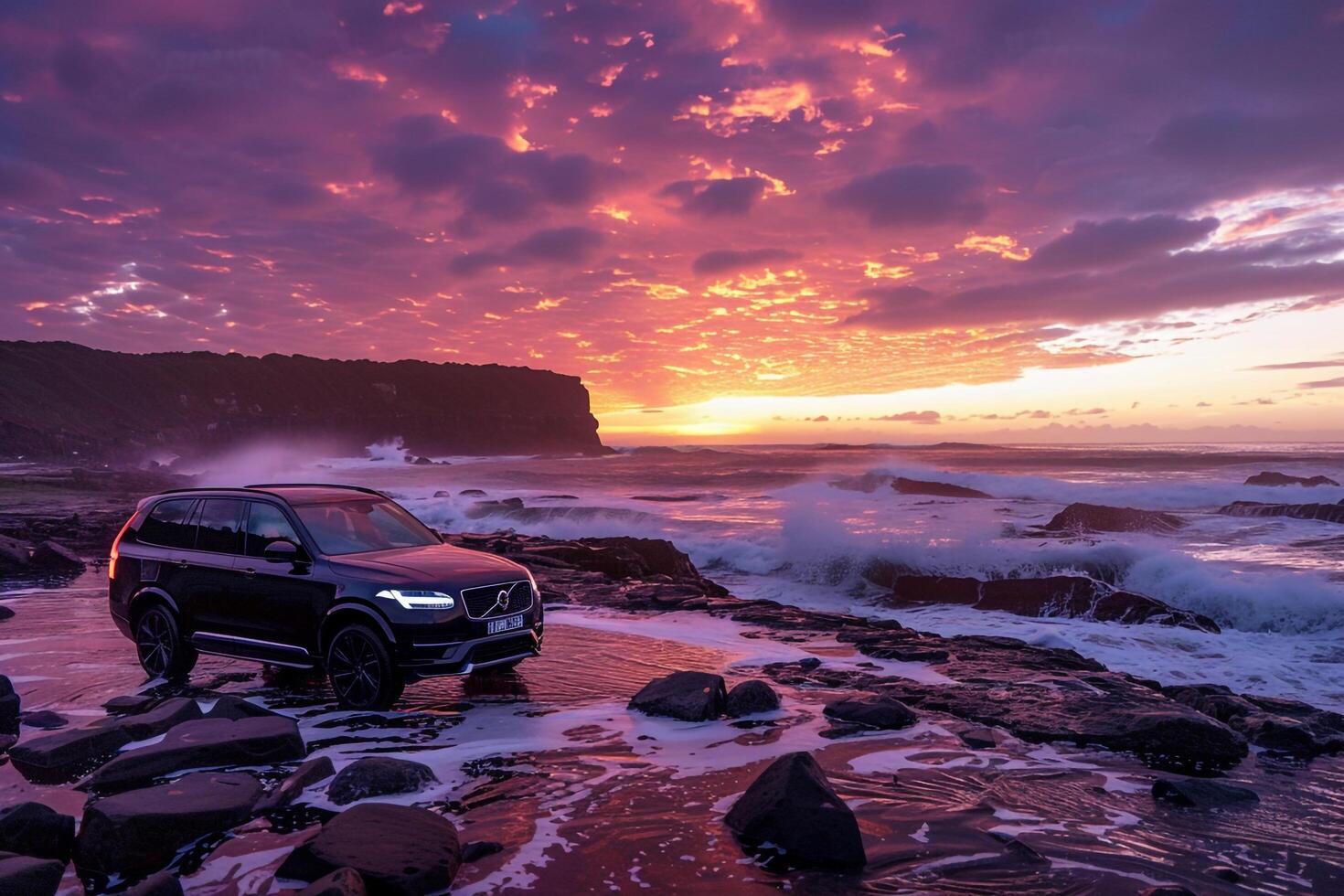 Luxury SUV on a coastal road with ocean view