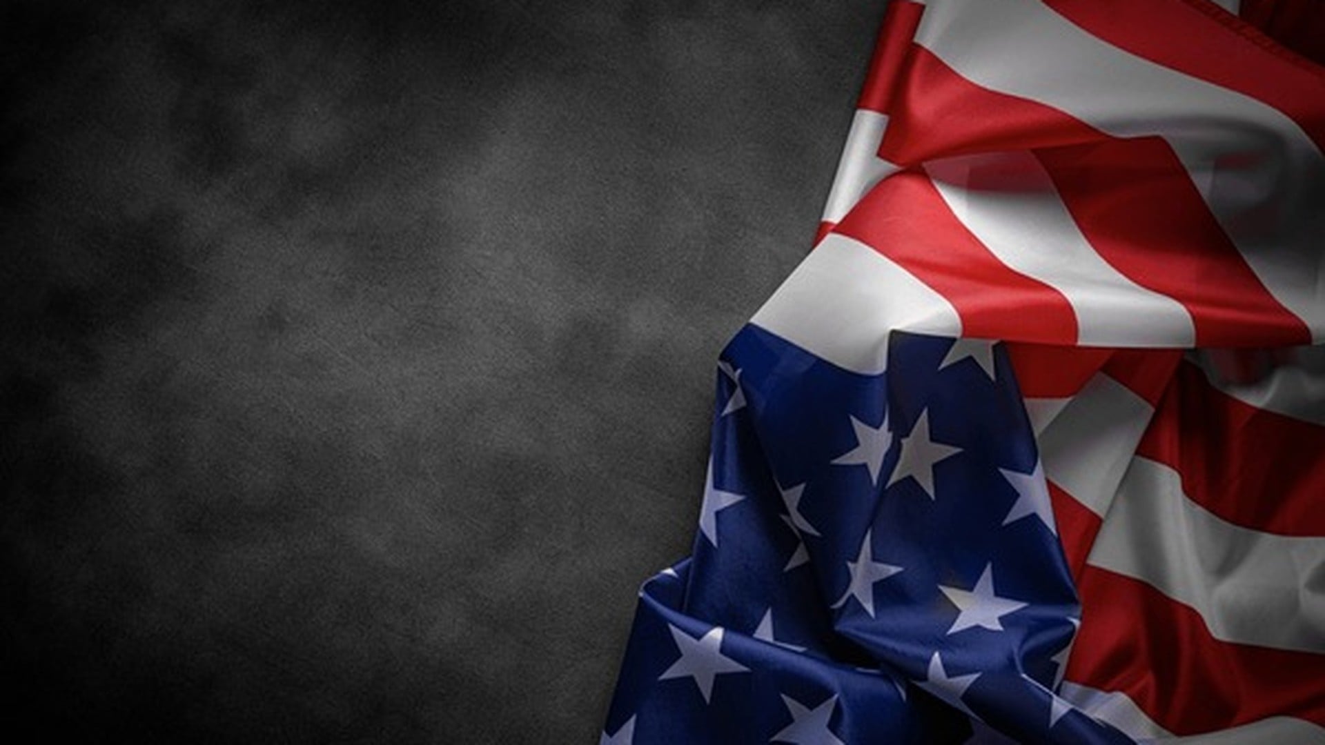 American flag with dramatic patriotic lighting