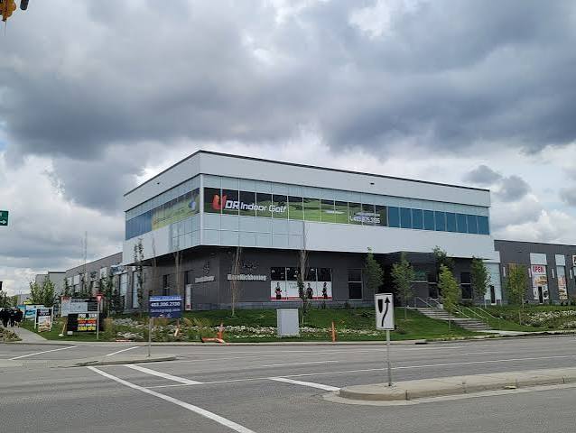 Golf facility storefront entrance on a city street
