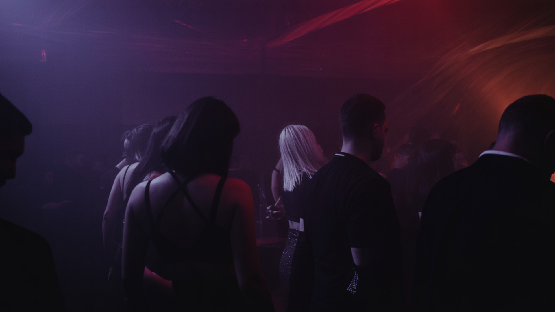DEEP LA house music event with atmospheric purple and red lighting