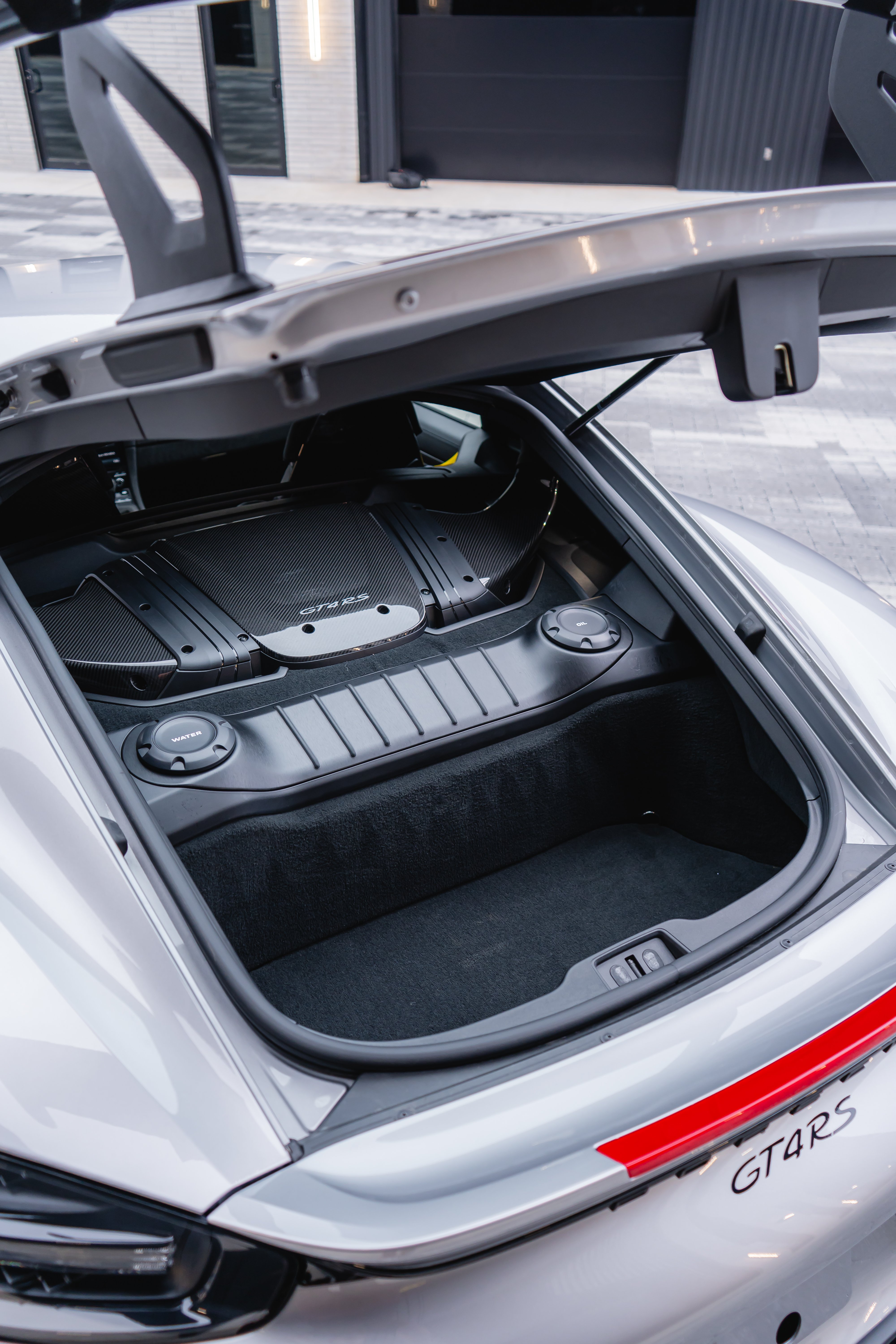 Rear engine bay with carbon fiber GT4 RS cover