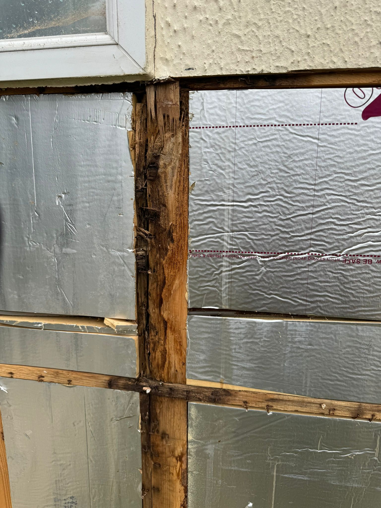 Park home side wall with freshly installed horizontal cladding boards