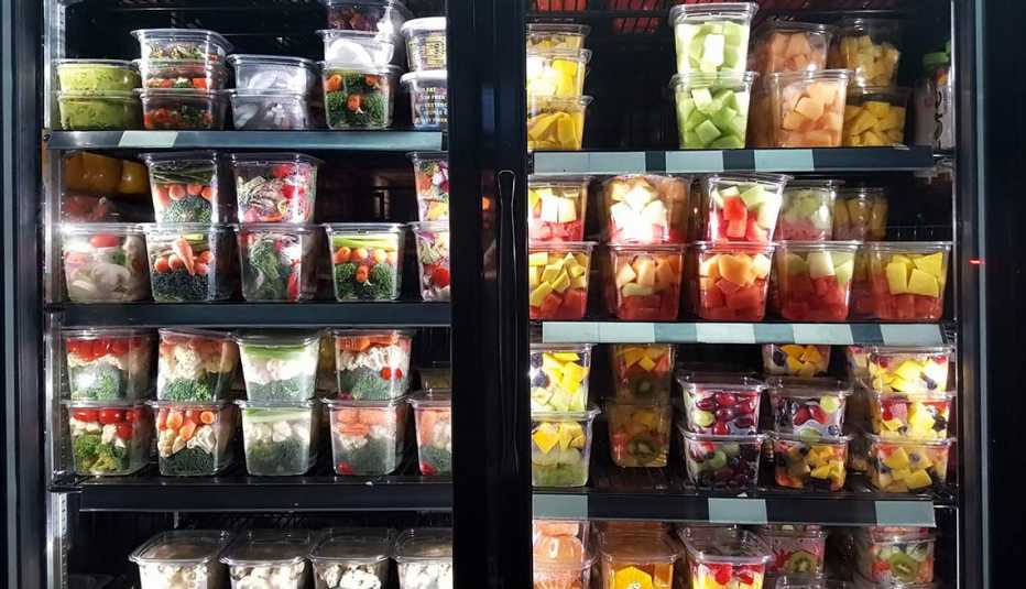 Convenience store shelves with drinks, snacks, and everyday essentials
