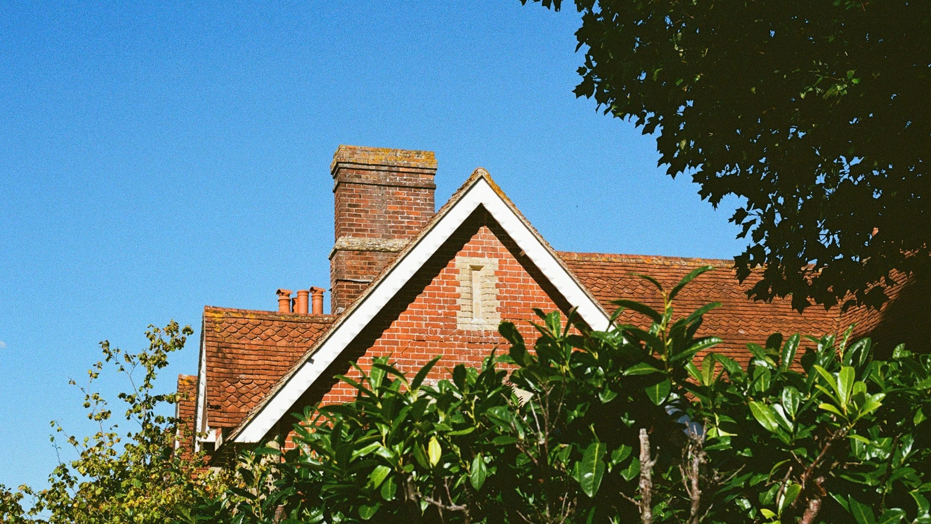 Red brick gable and chimney on UK house