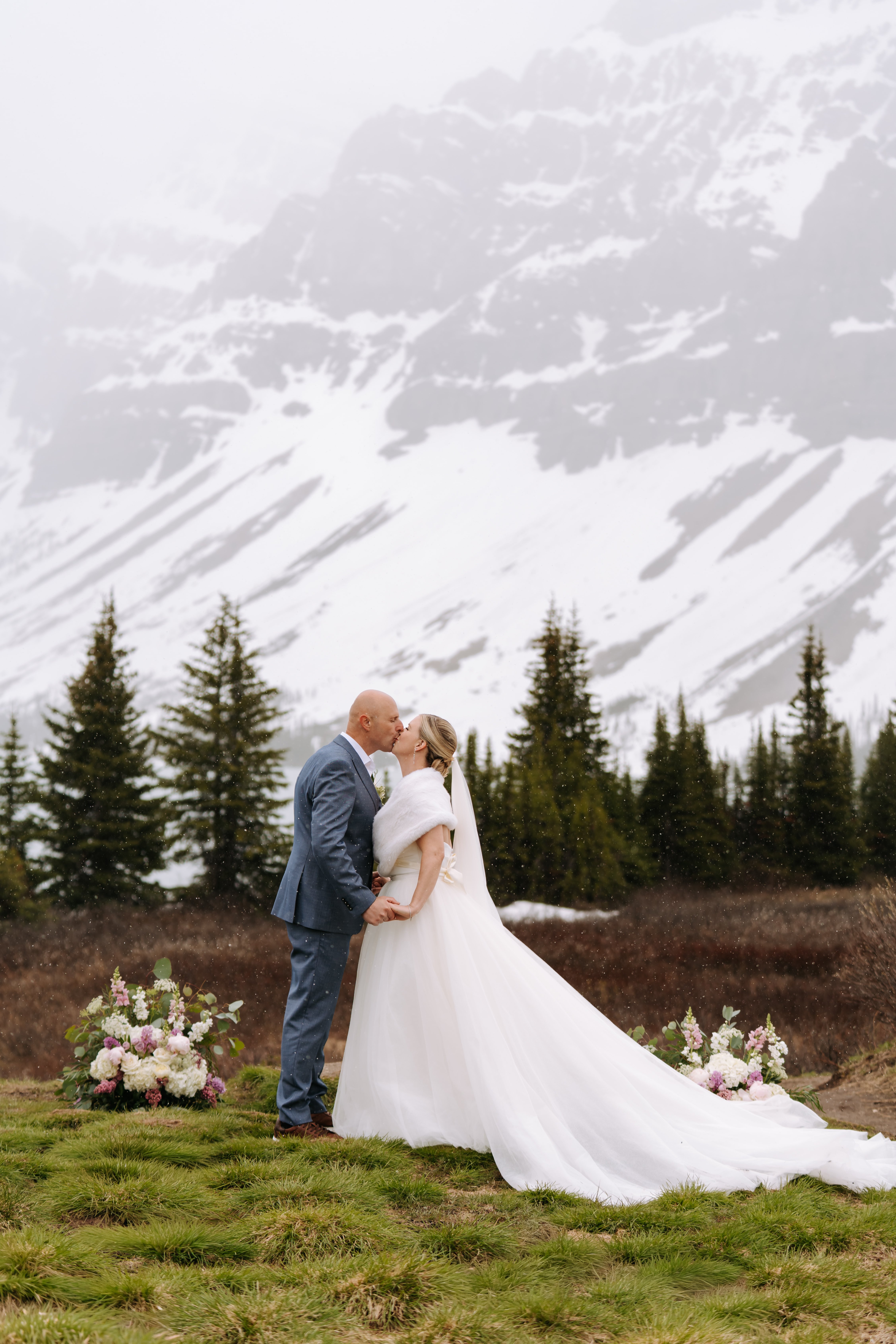 Mountain wedding scene with natural greenery
