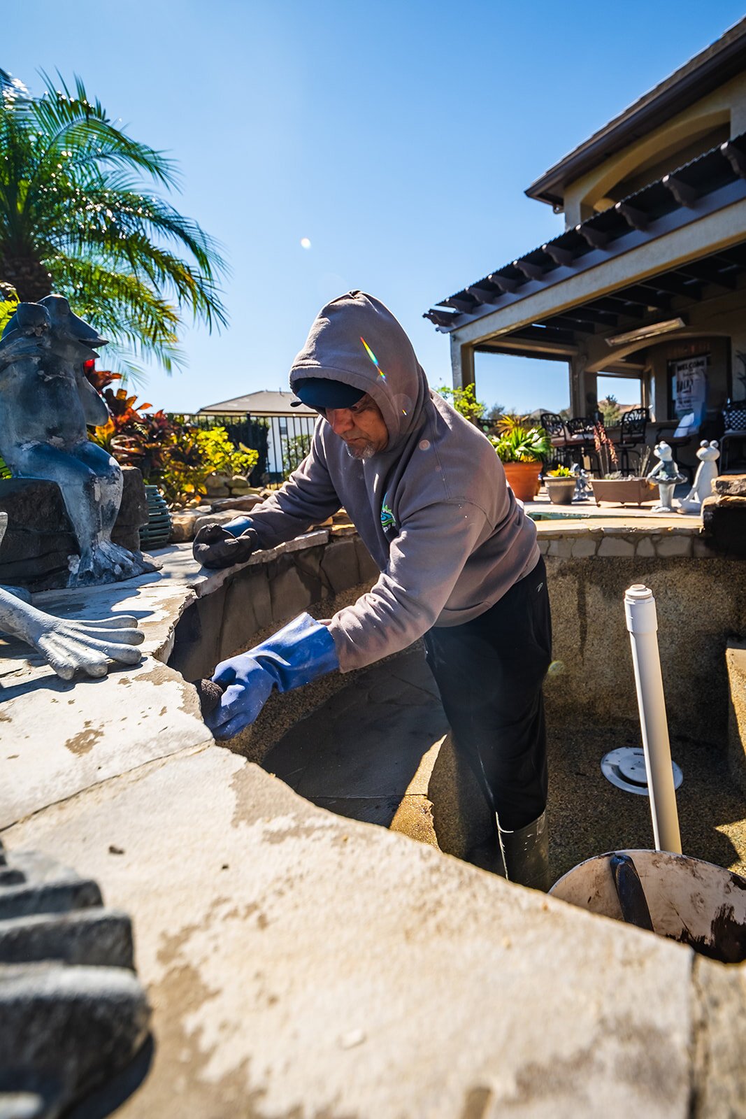Pool cleaning in progress with professional equipment