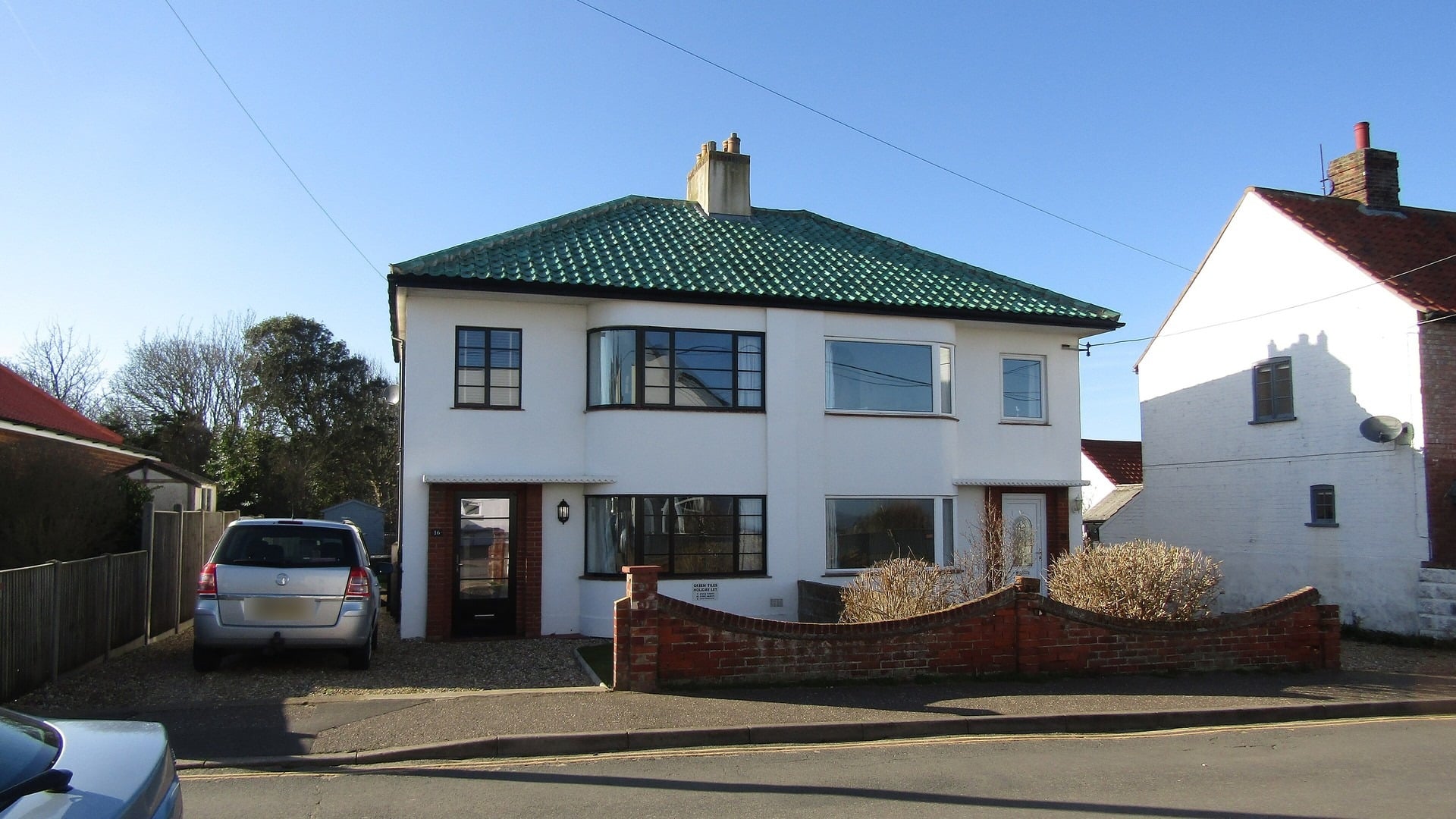 Moss & Algae Removal service on a UK residential property — Storm Proof Roofing