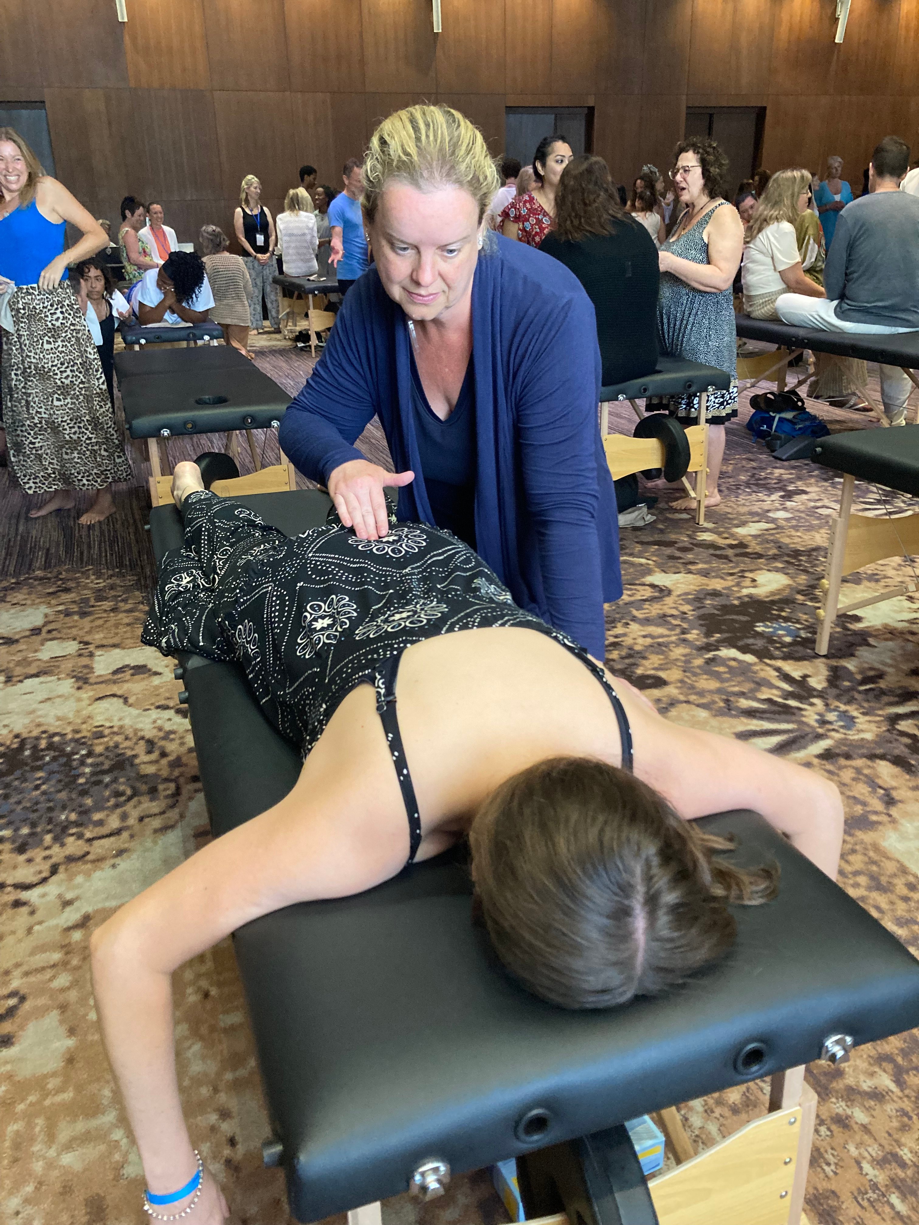 Sarah Fausett performing Spinal Flow Technique at the immersive training in Playa del Carmen, Mexico