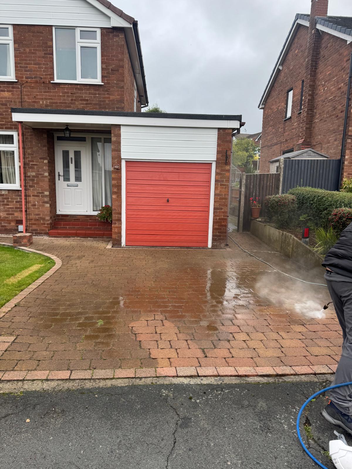 Pressure washer equipment on a UK patio ready for cleaning
