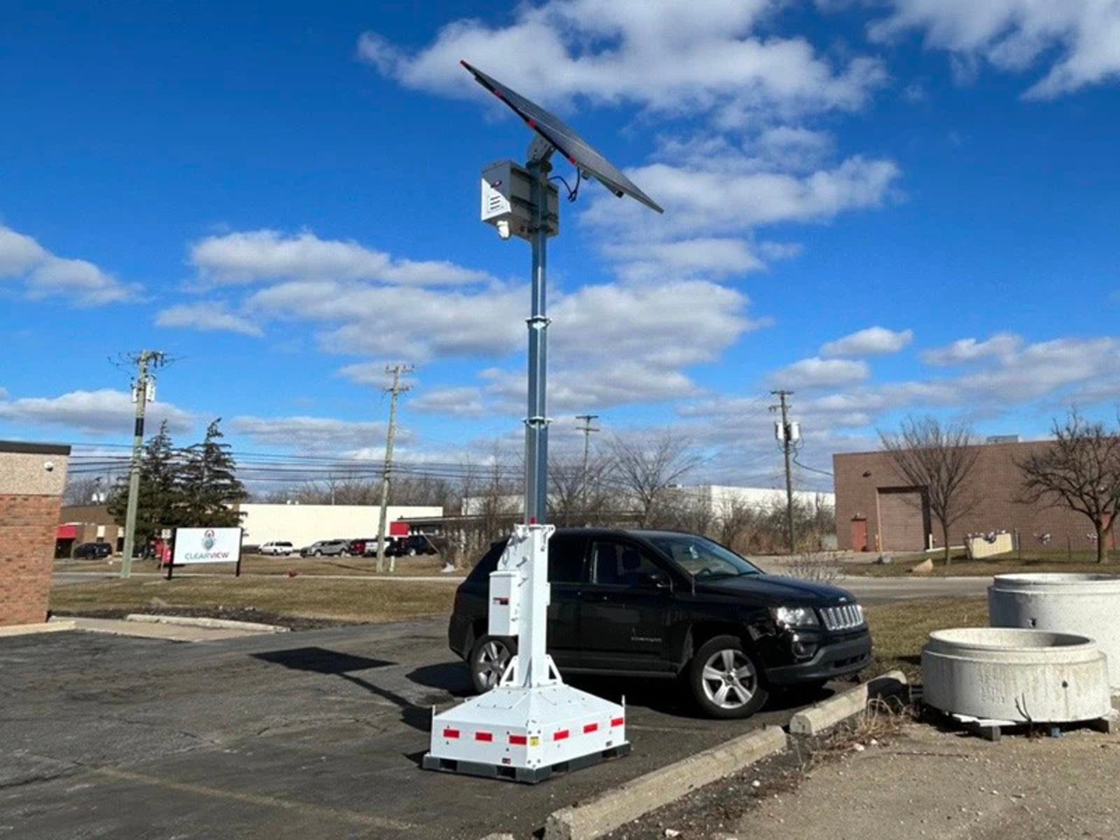 Temporary security camera tower on Phoenix construction site for theft prevention