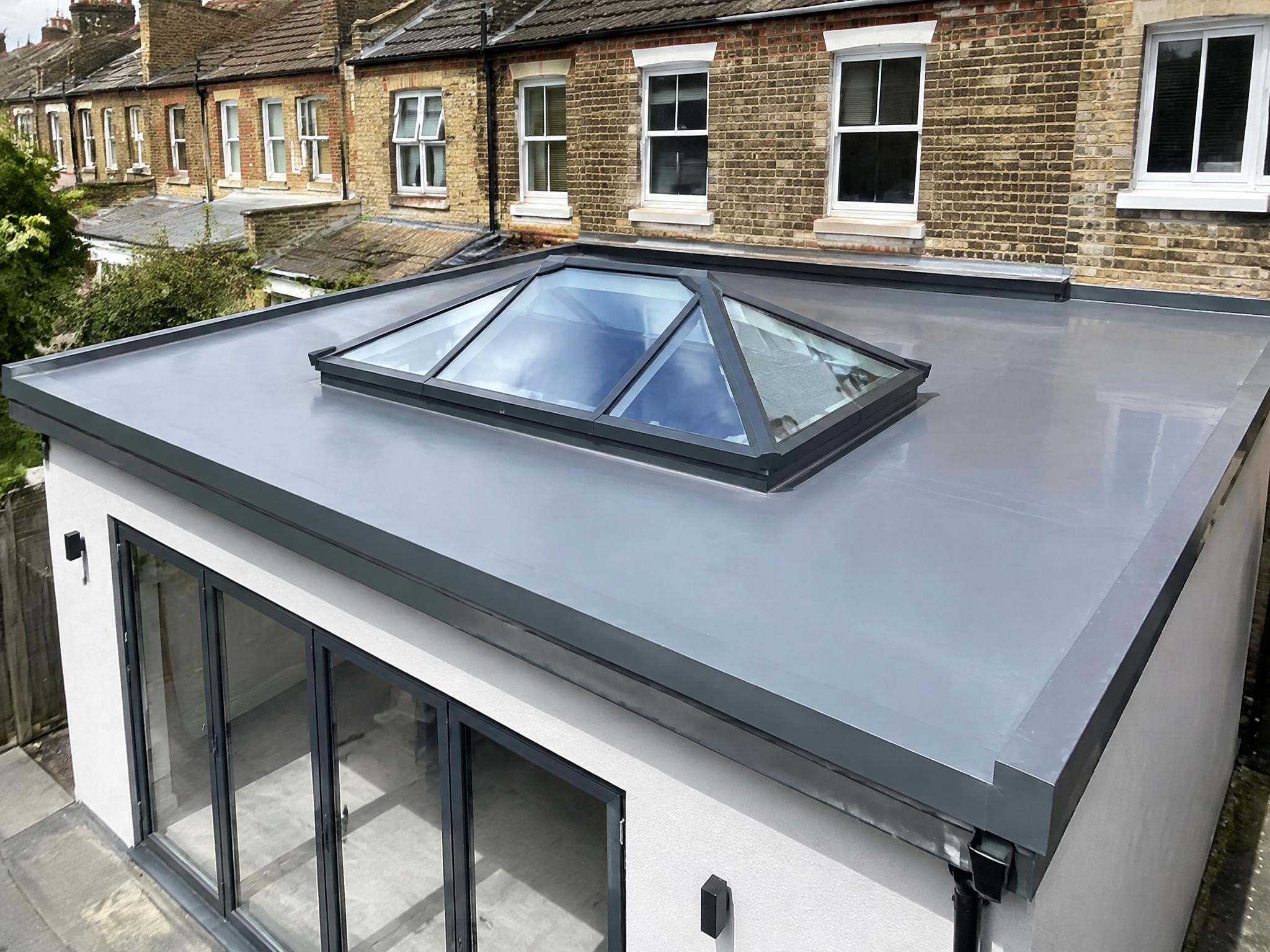 Fibreglass flat roof with roof lantern on a UK extension