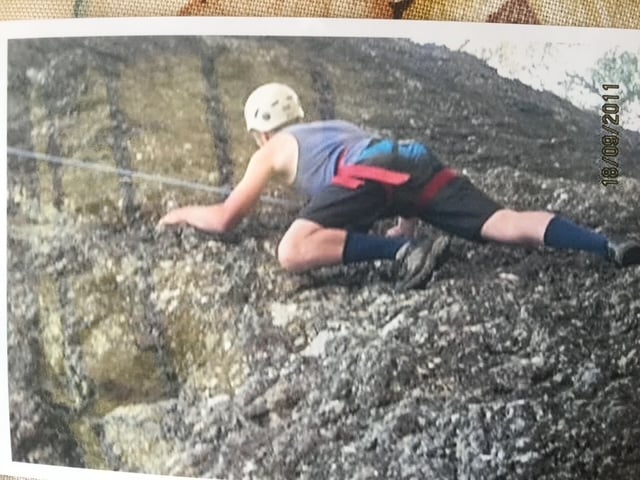 Rock climbing activities demonstrating hands-on youth engagement