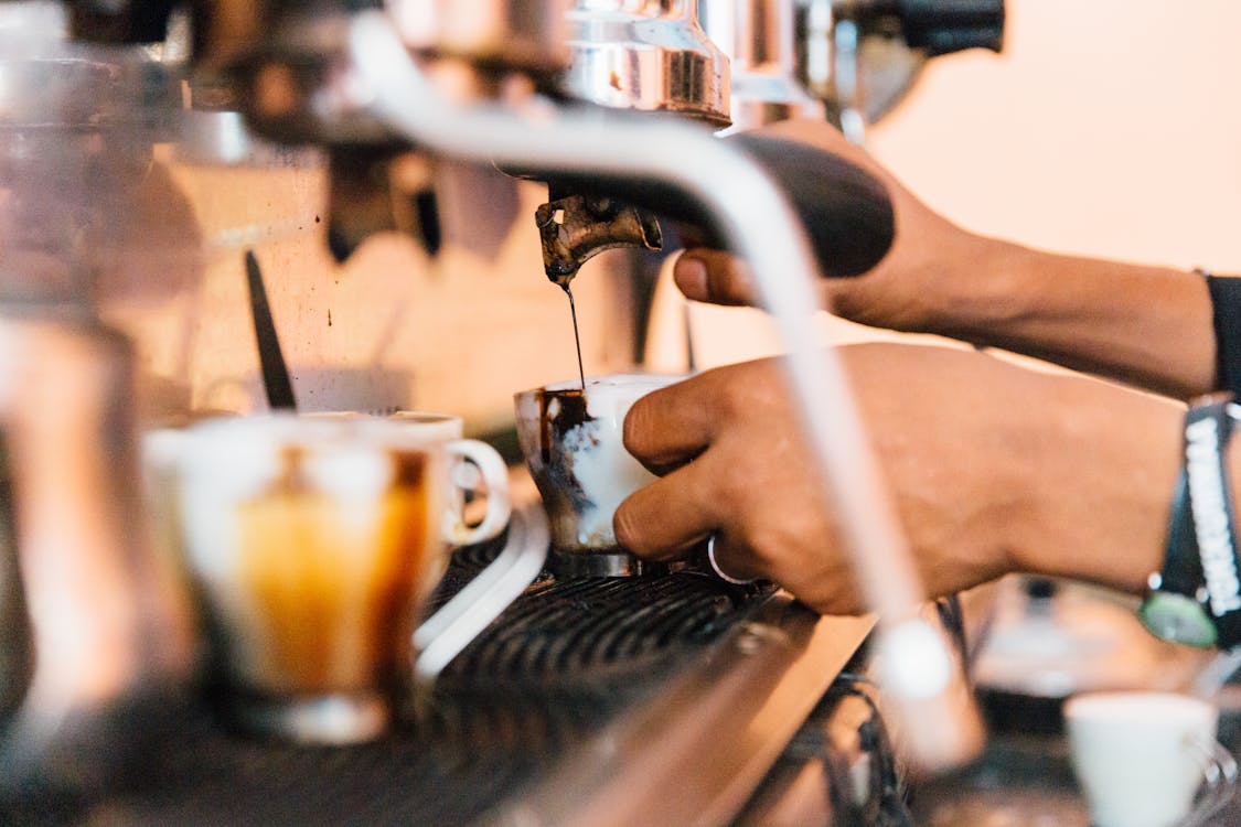 Barista pouring latte art