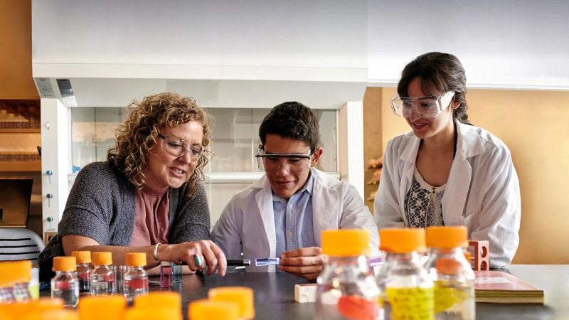 Students collaborating in a STEM research lab