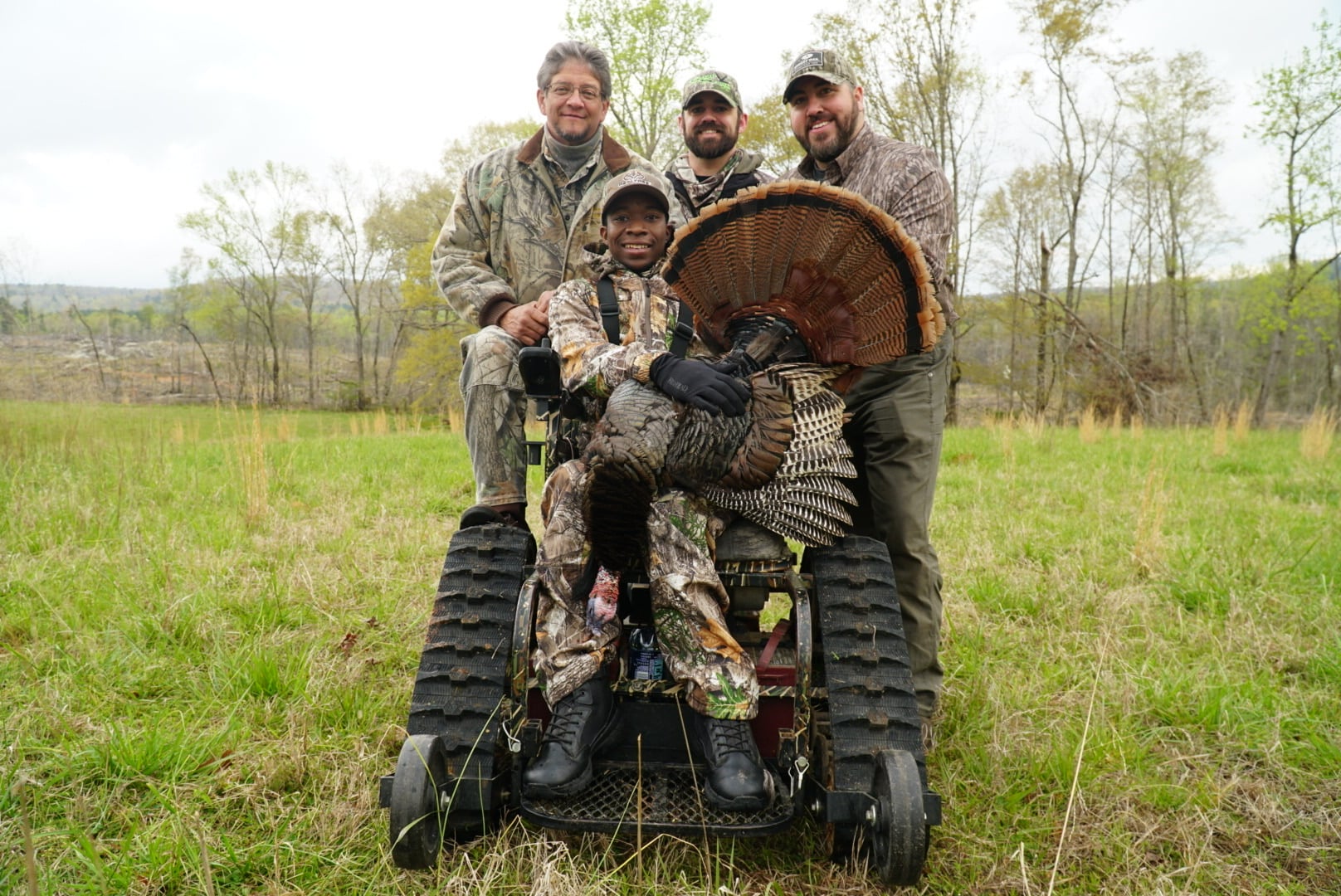 Joshua and friends with a turkey harvest in the Kentucky hills