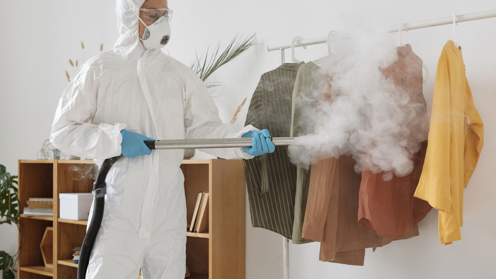 Pest control technician inspecting and treating a Bulawayo home interior