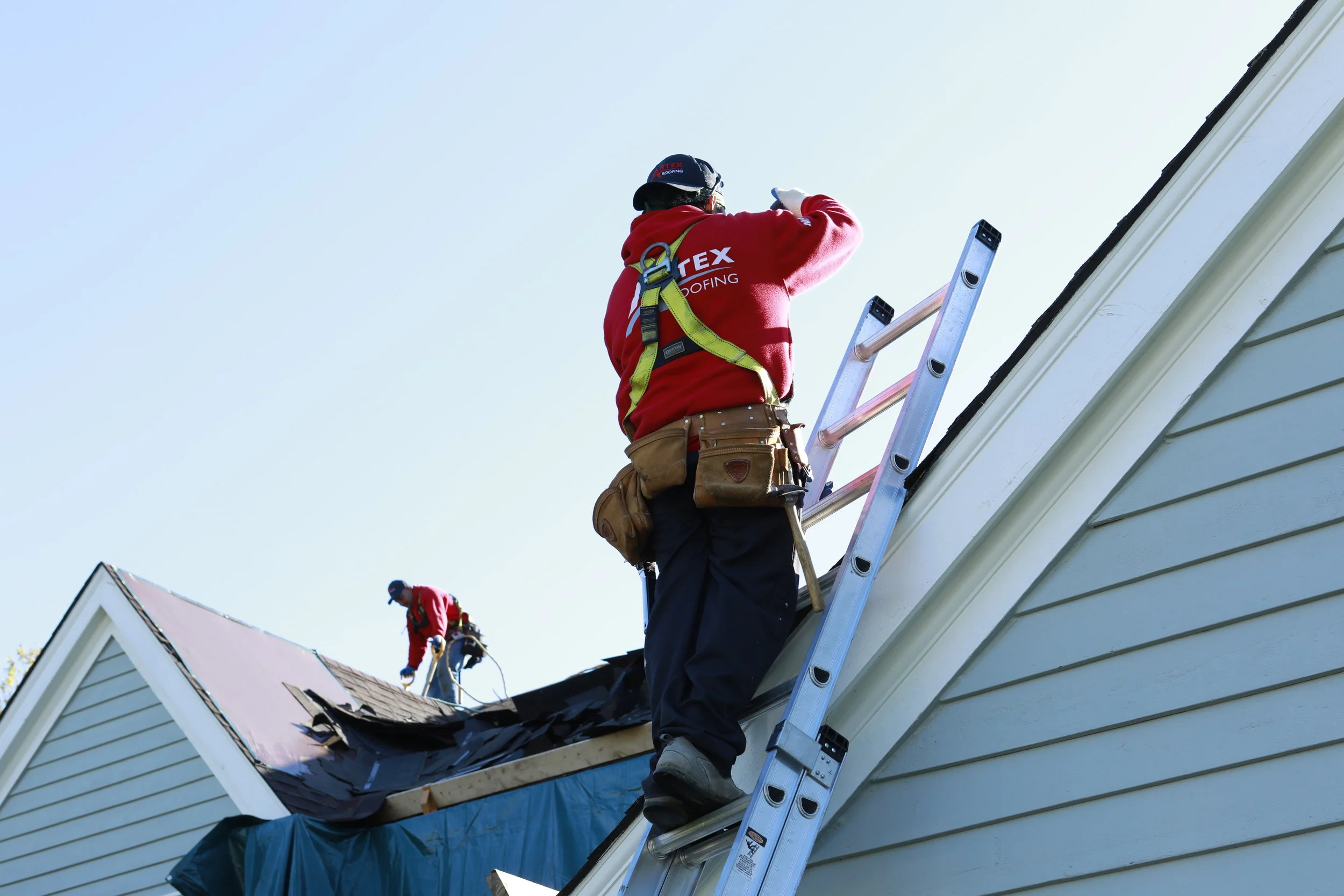 A1 Ted Gutters team working on gutters