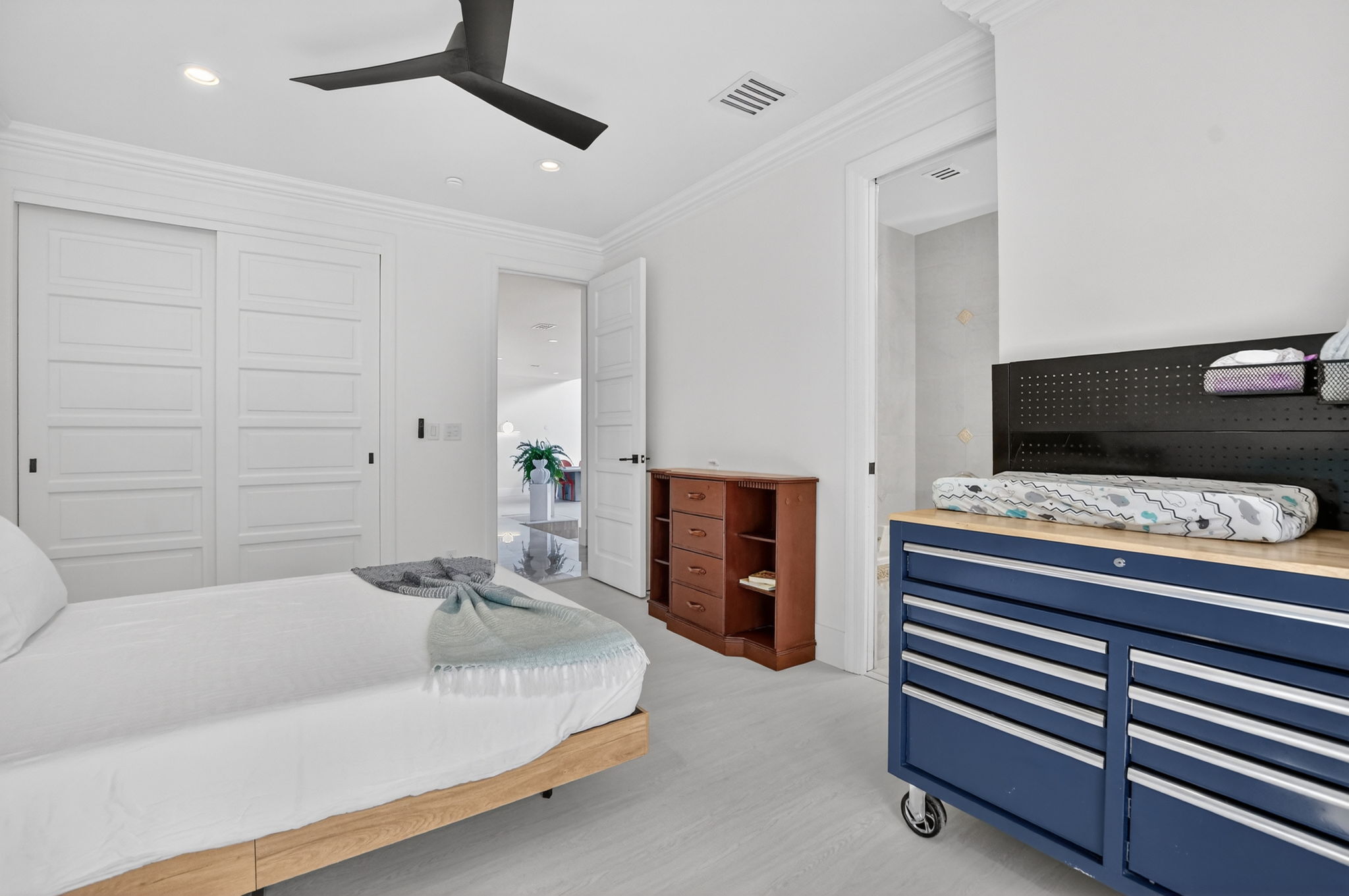 Bedroom with gray bedding