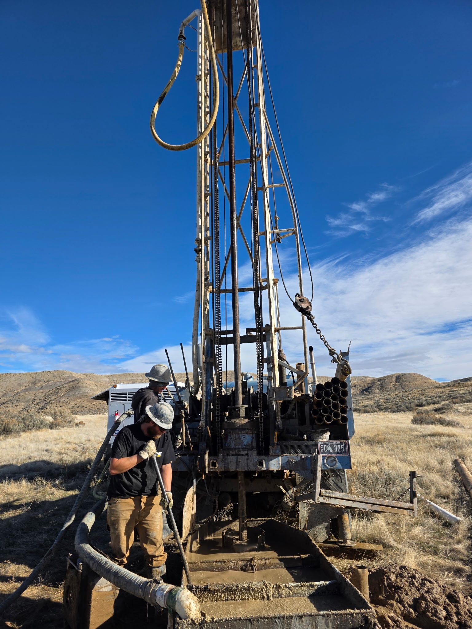 Wyoming Water Wells drilling rig operating in the field