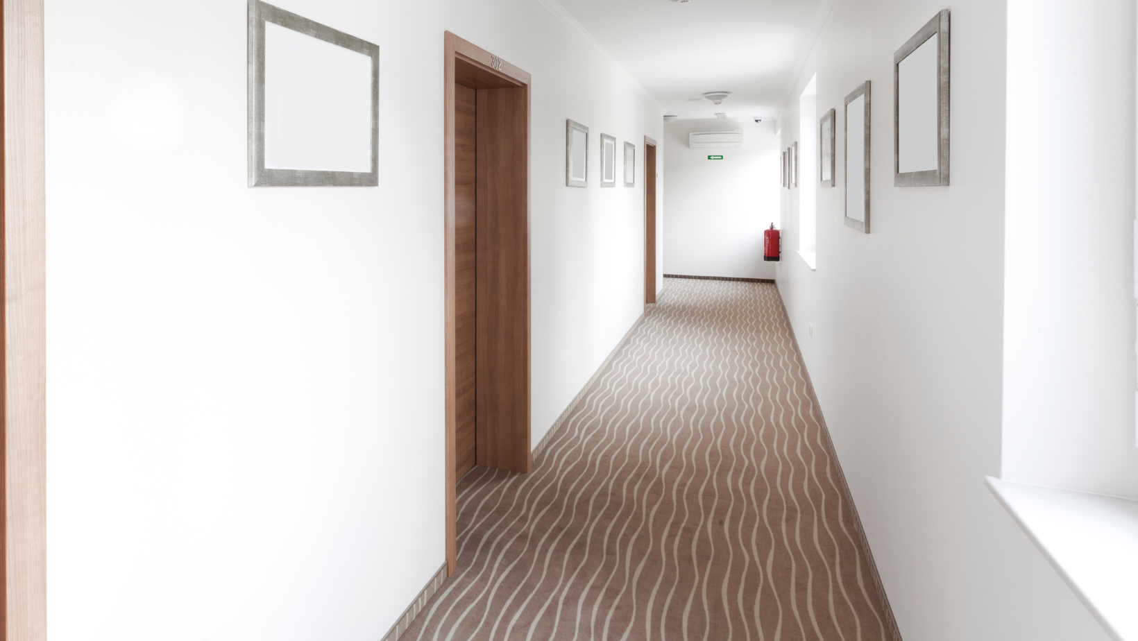 Clean, well-maintained apartment building common area