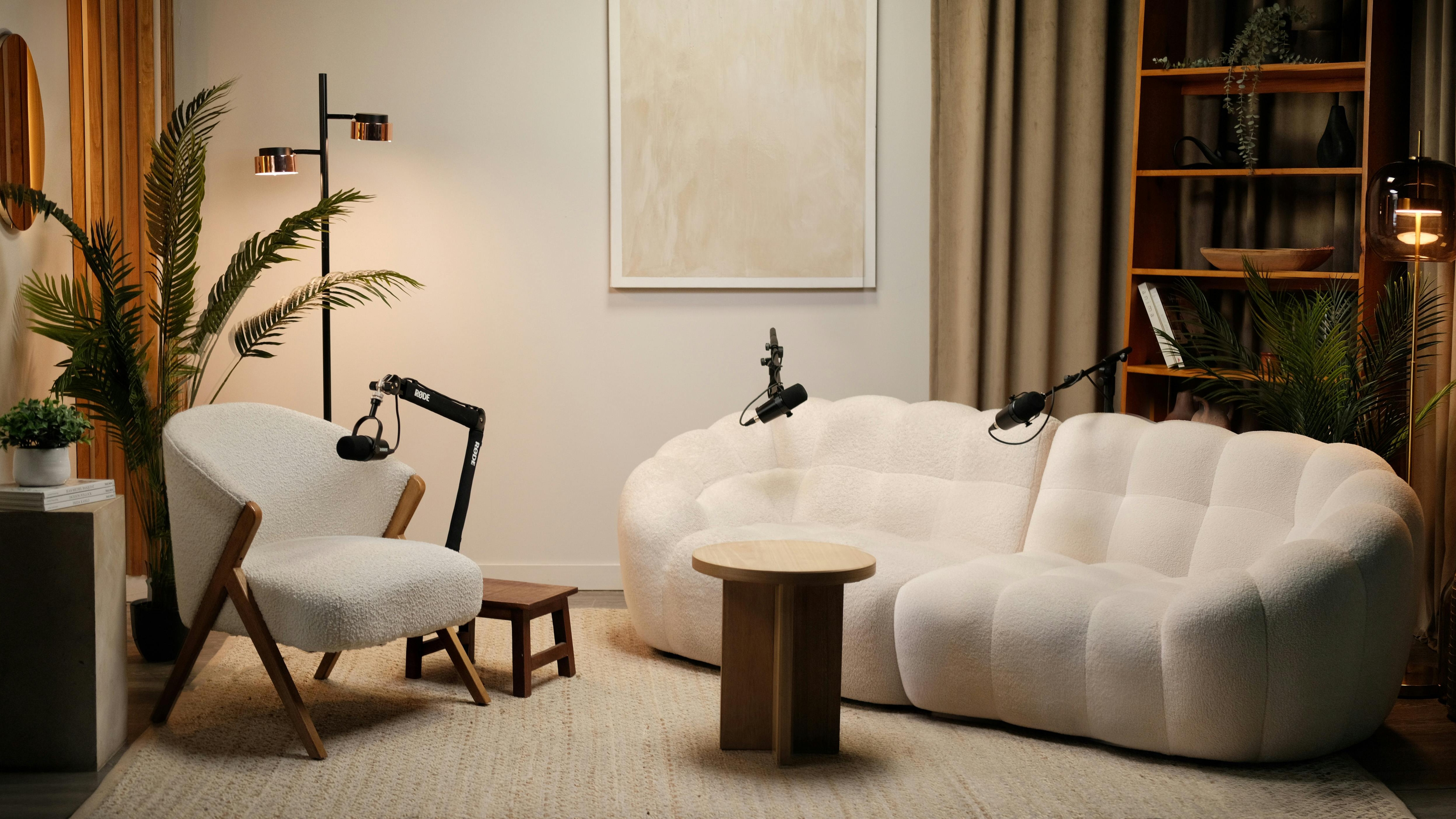 The Aural Parlour intimate recording studio with velvet furnishings and warm golden lighting