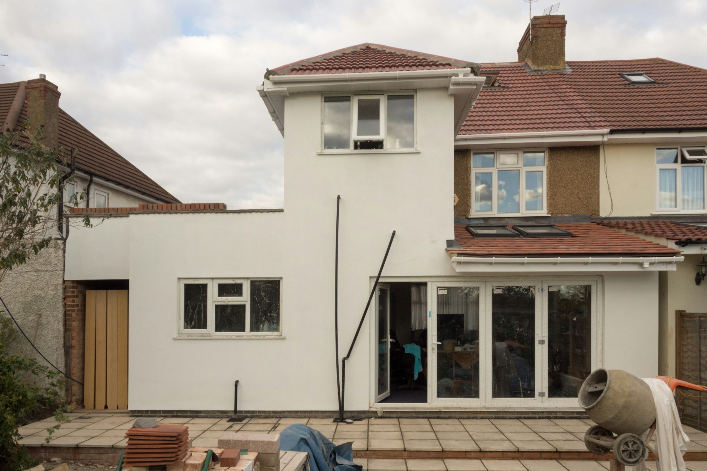 Rendered rear extension with a flat roof