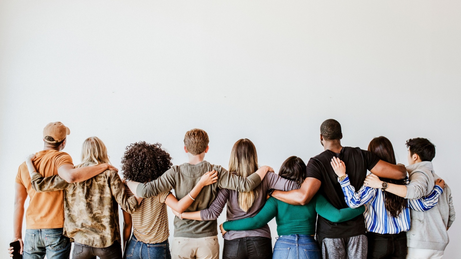Diverse team of volunteers working together in community service