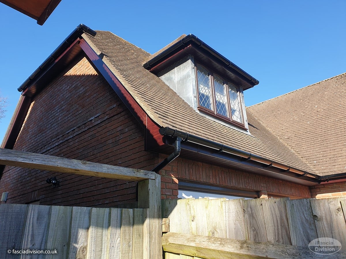 Close-up of uPVC soffit board ventilation under a roof overhang