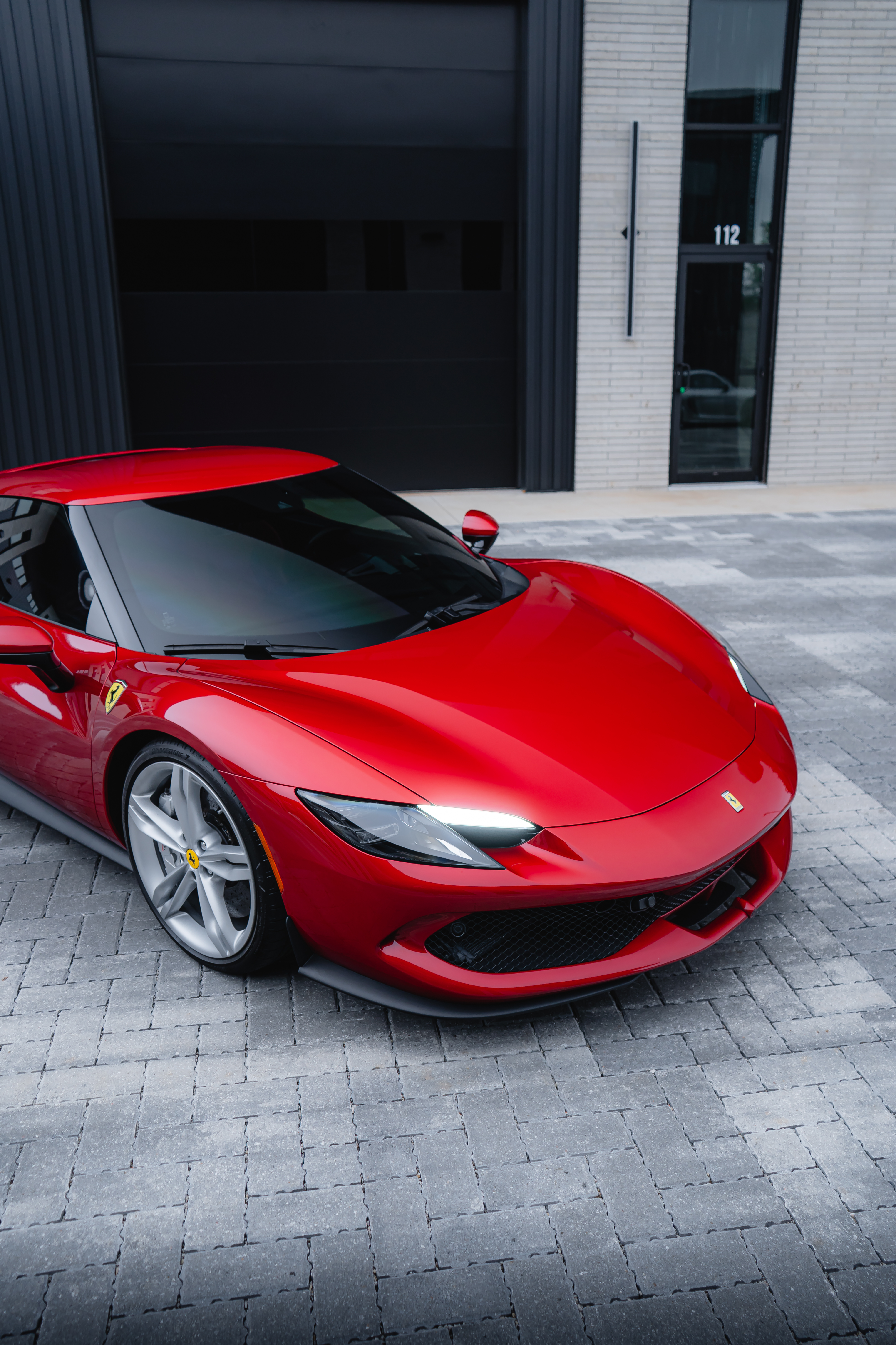 2022 Ferrari 296 GTB in red, close front-angle view