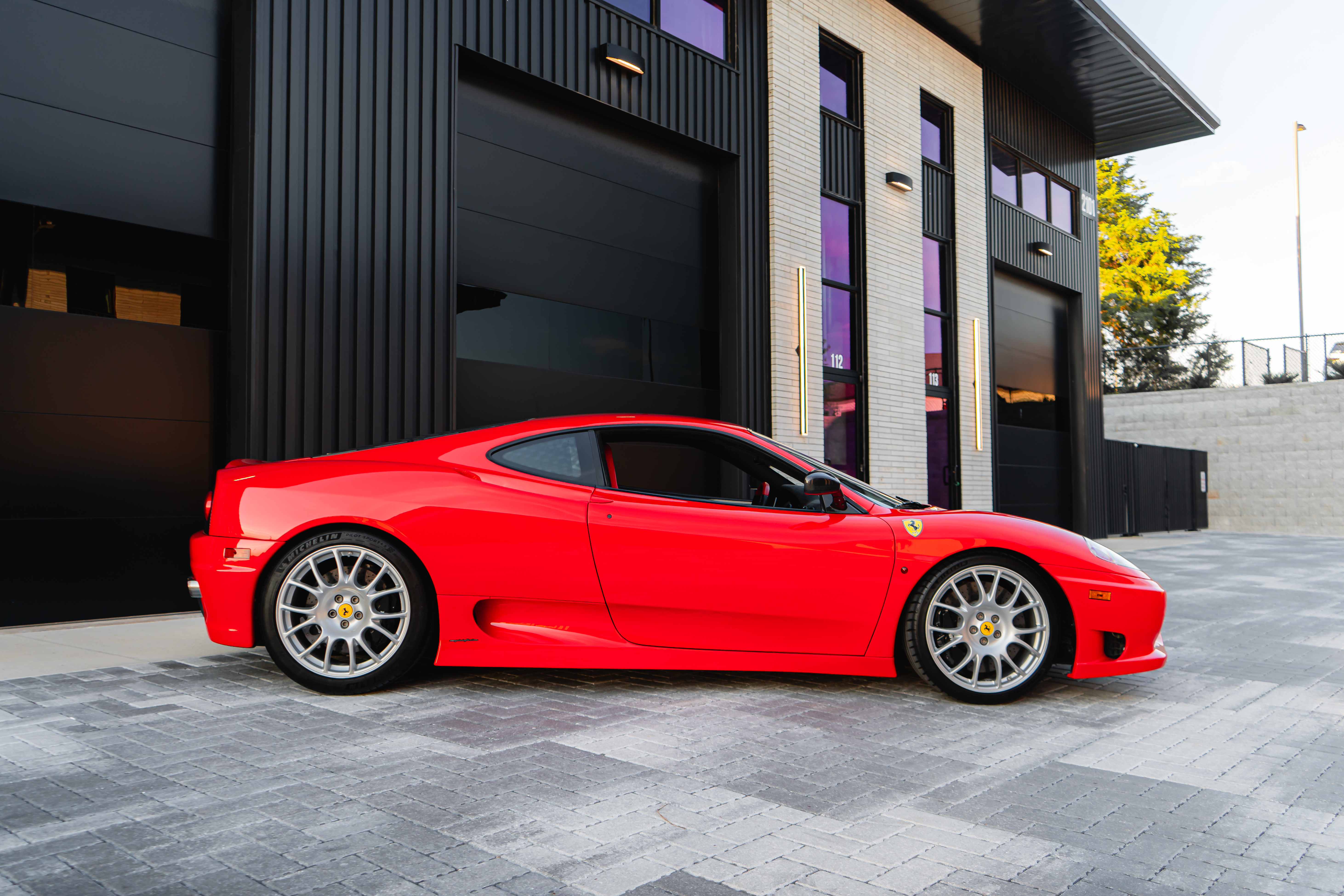 2004 Ferrari 360 Challenge Stradale side profile in red