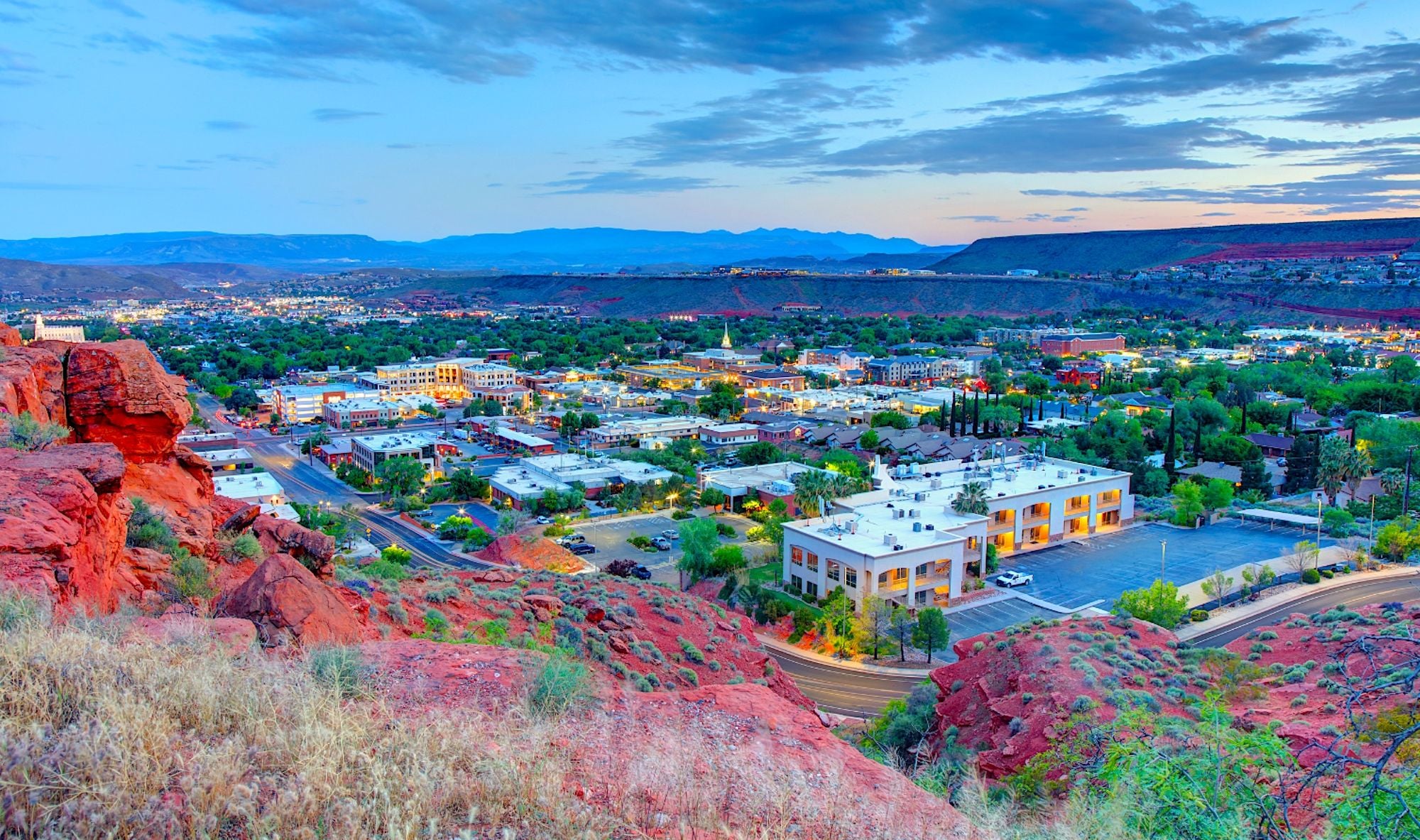 Aerial view of St. George, Utah with red rock landscape and city