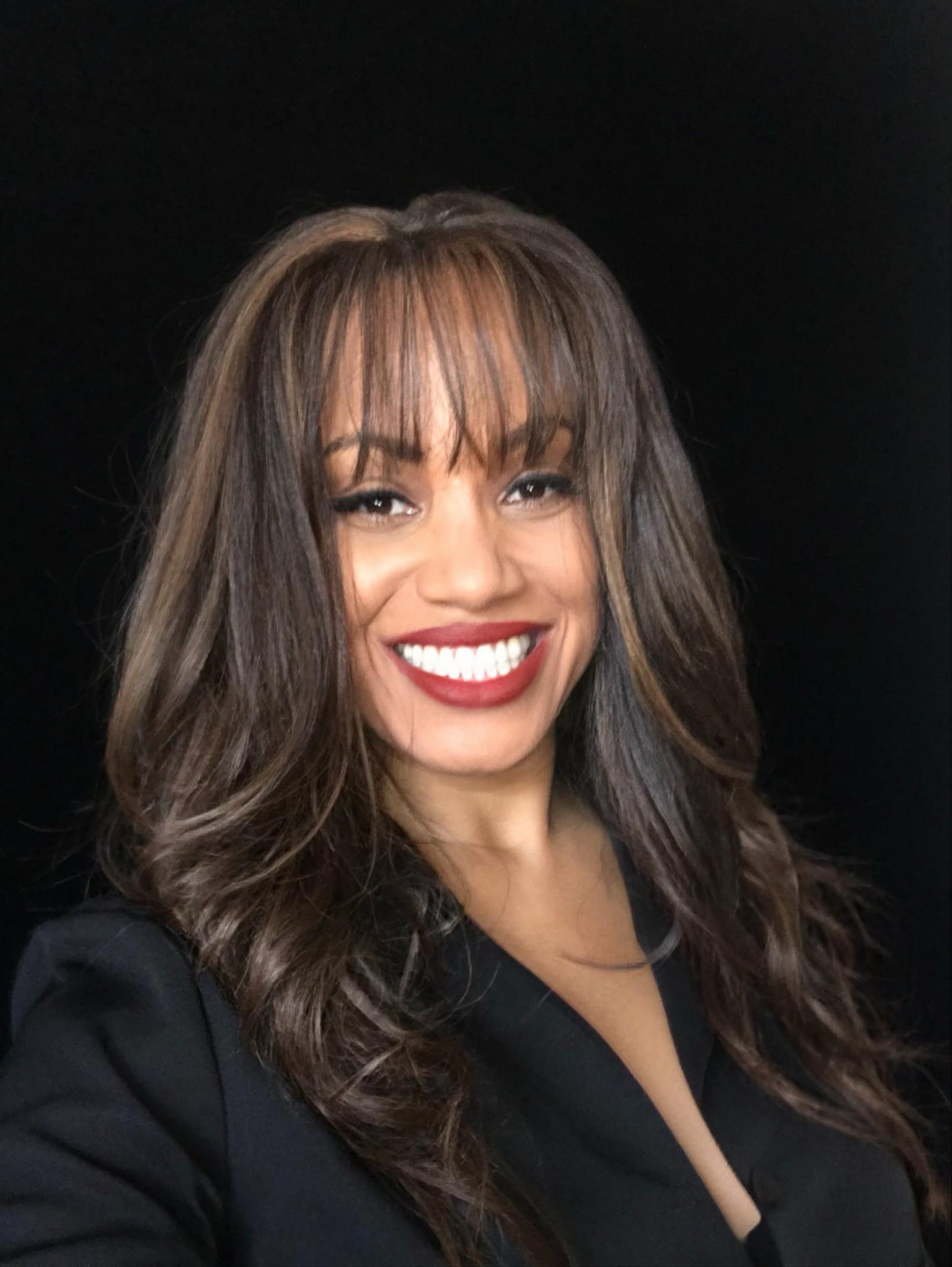 LyNea Bell - Executive portrait, black blazer on black background