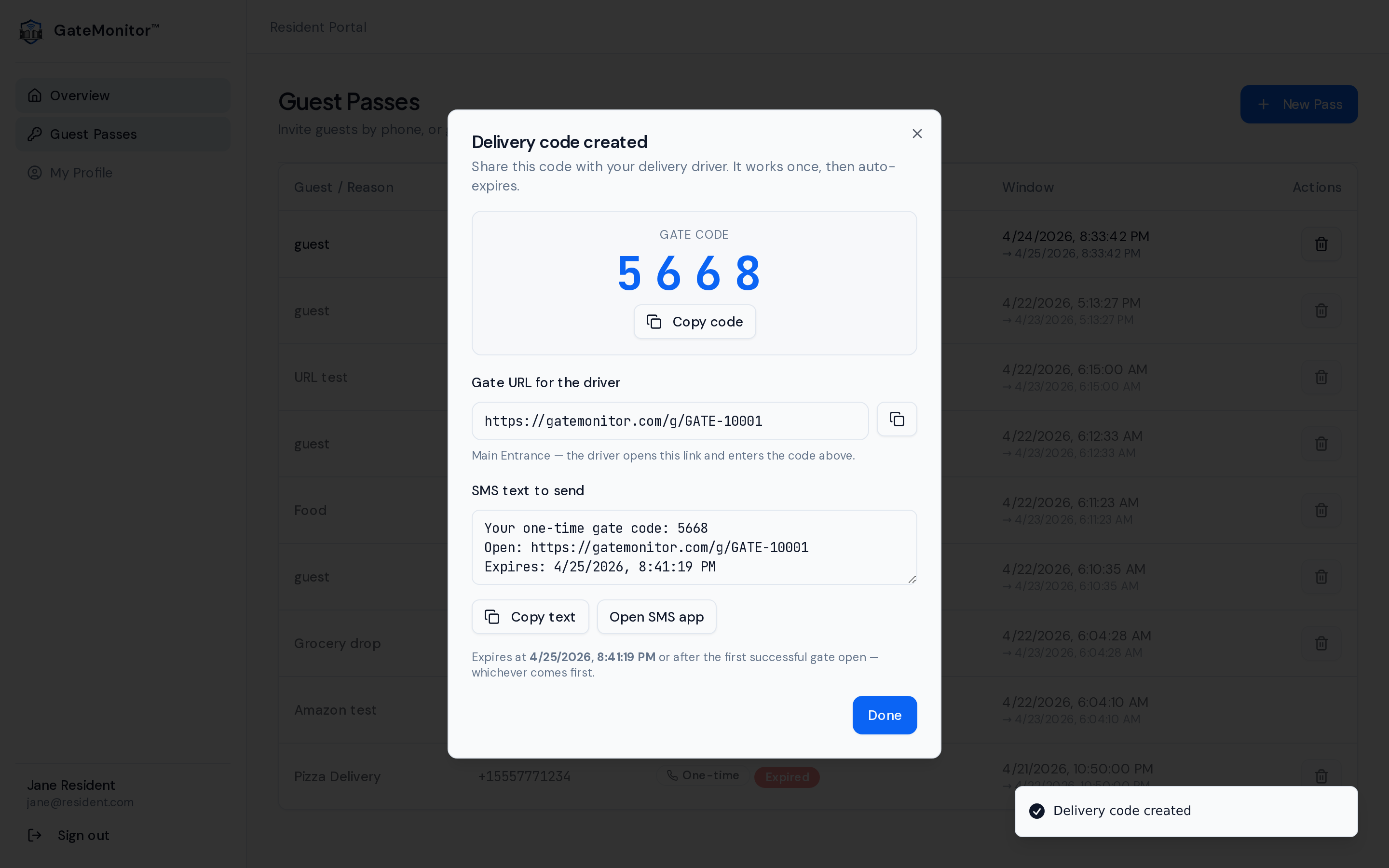 Resident portal — delivery code created modal showing a one-time code with copy buttons and an SMS preview to send to the driver