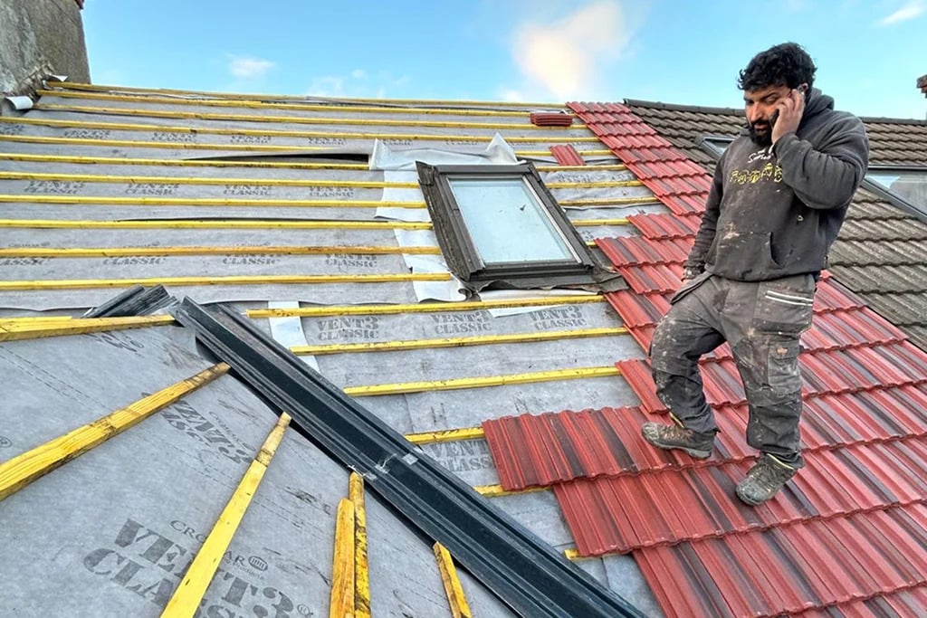 Completed roof tile repair on a UK property
