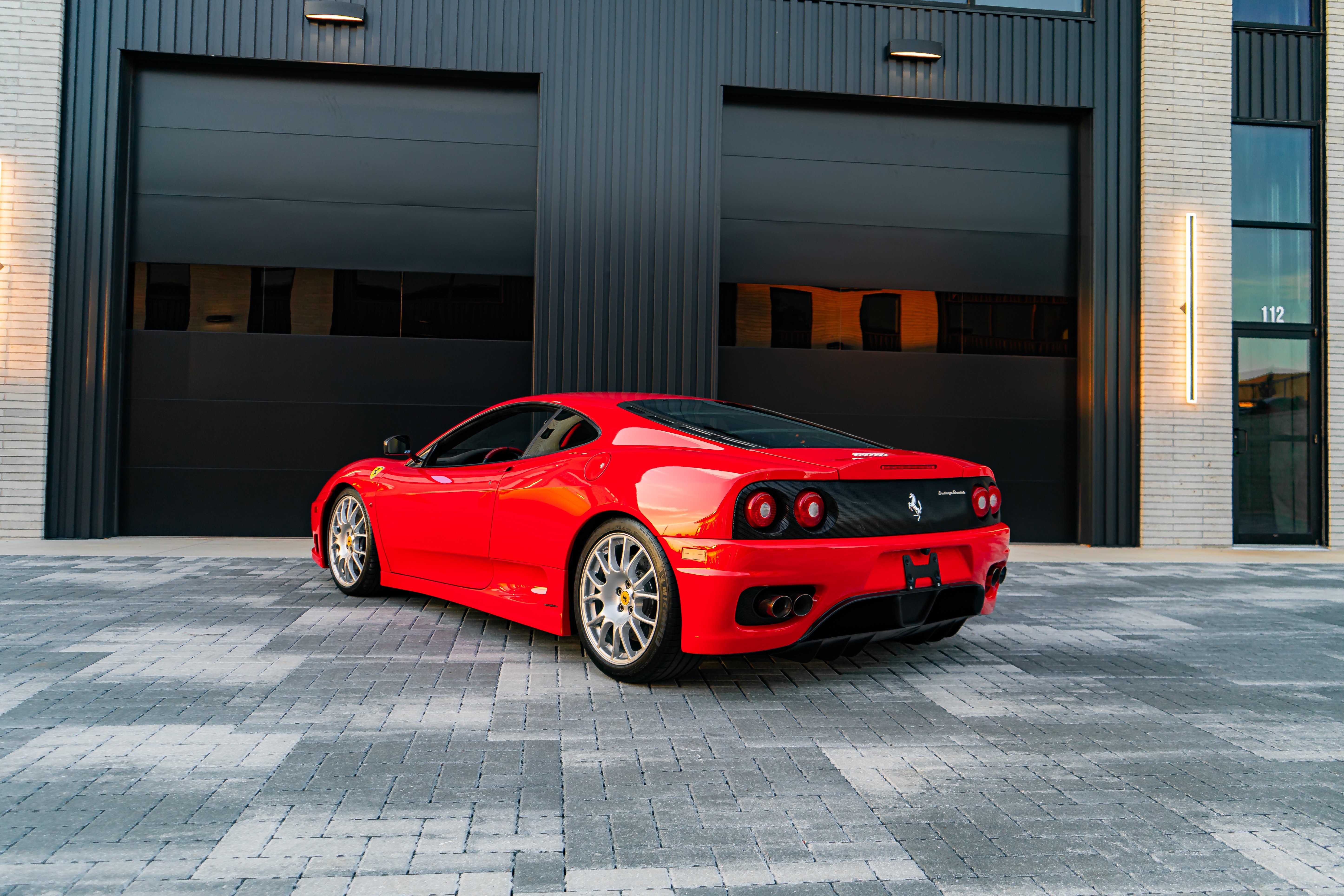2004 Ferrari 360 Challenge Stradale rear view at sunset