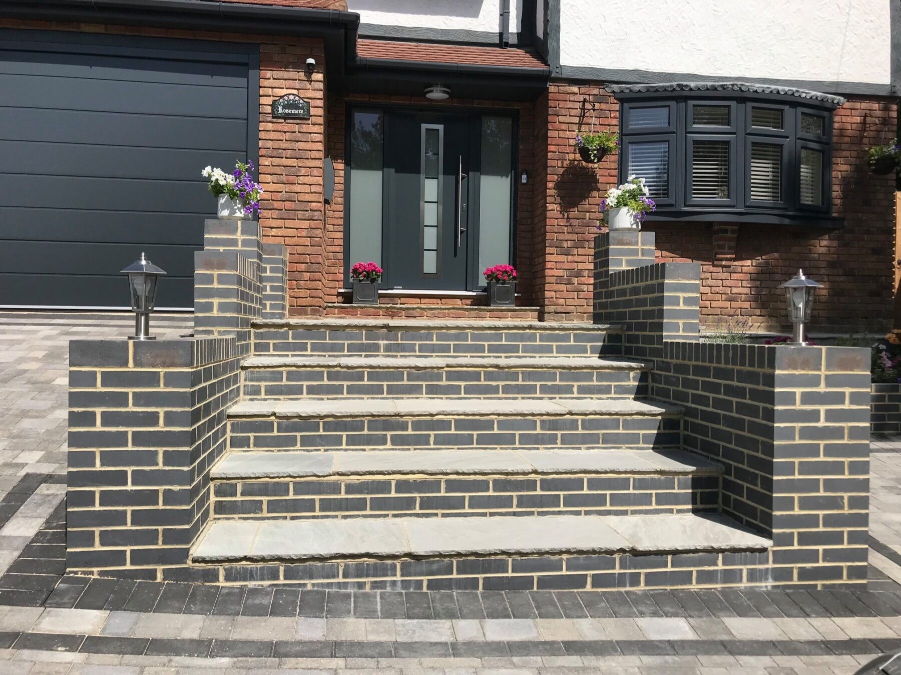 Garden wall with decorative coping