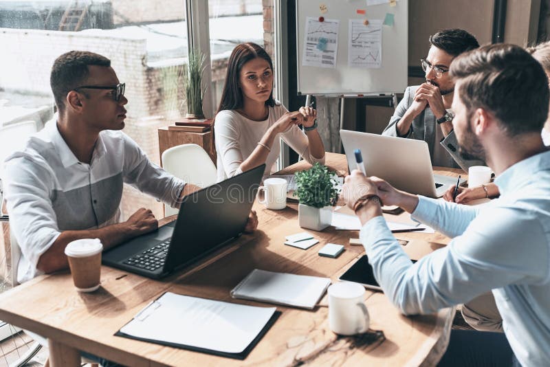 Veyra Media creative team working together in a modern office