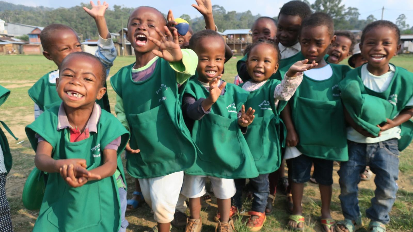 Volunteers working with children